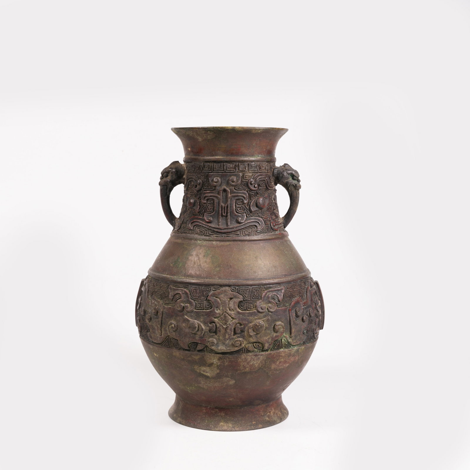 A BRONZE VASE WITH BEAST MASK PATTERN AND BEAST EARS: Bronze Vase with Beast Mask Pattern and Beast Ears