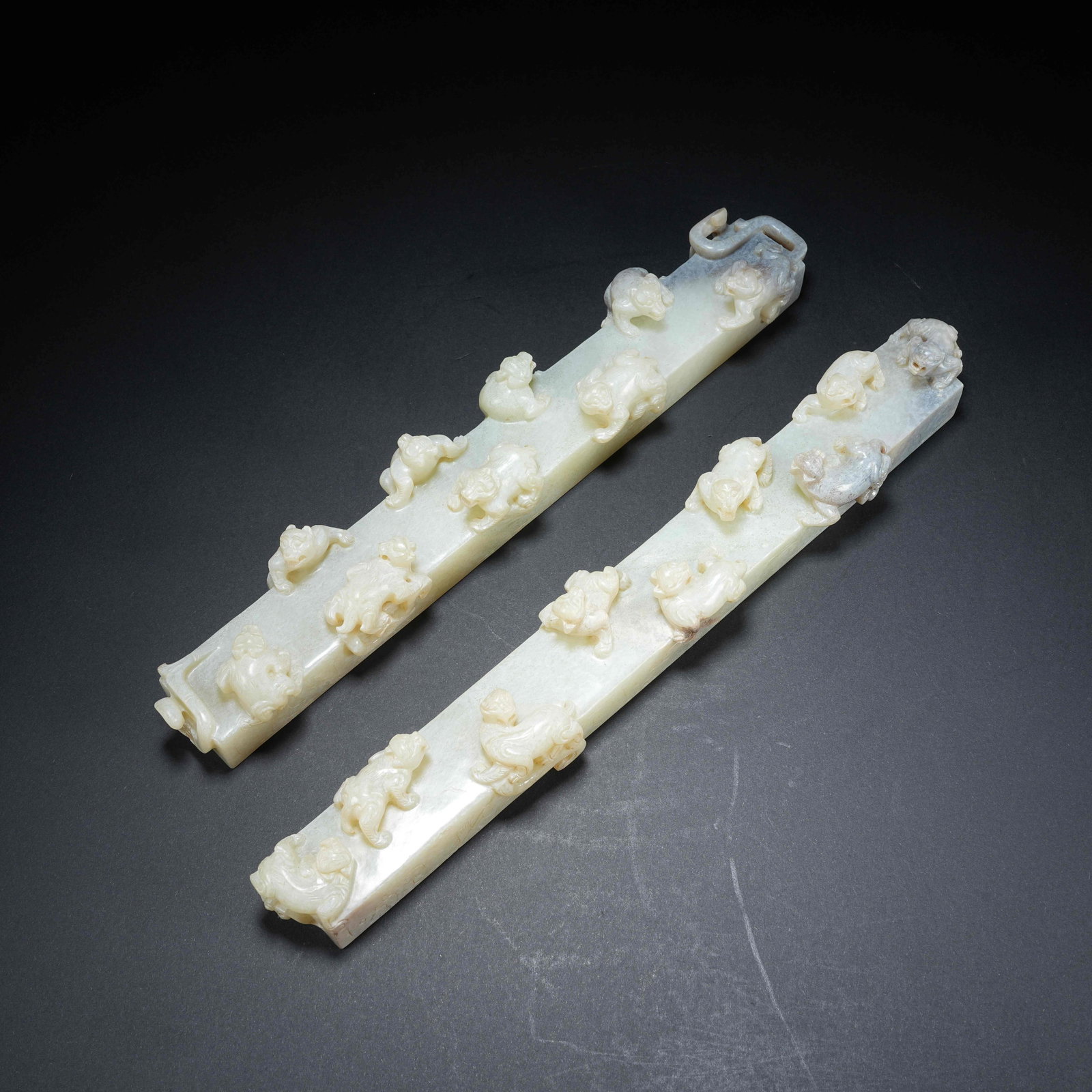 A SET OF ANCIENT JADE HIGH-RELIEF PAPERWEIGHTS CARVED WITH NINE BEASTS (1 of 11)