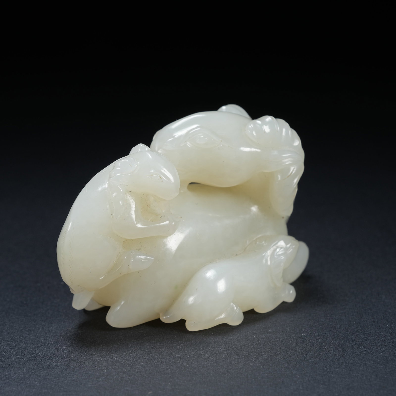 A HETIAN JADE ORNAMENT OF THREE YANGS BRINGING PROSPERITY: Hetian Jade Ornament of Three Yangs Bringing Prosperity