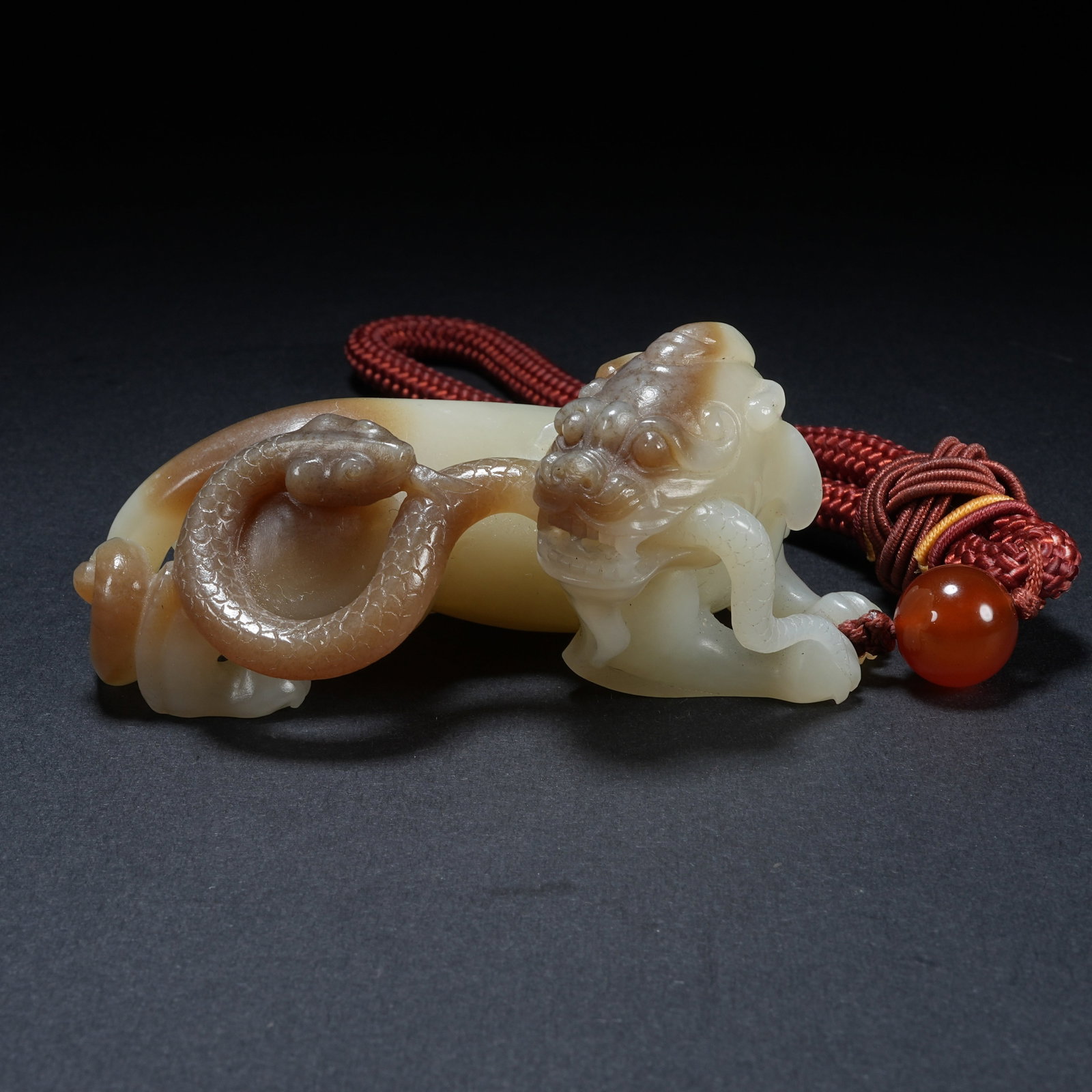 A HETIAN JADE HAND PIECE OF PIXIU AND SPIRITUAL SNAKE (1 of 8)