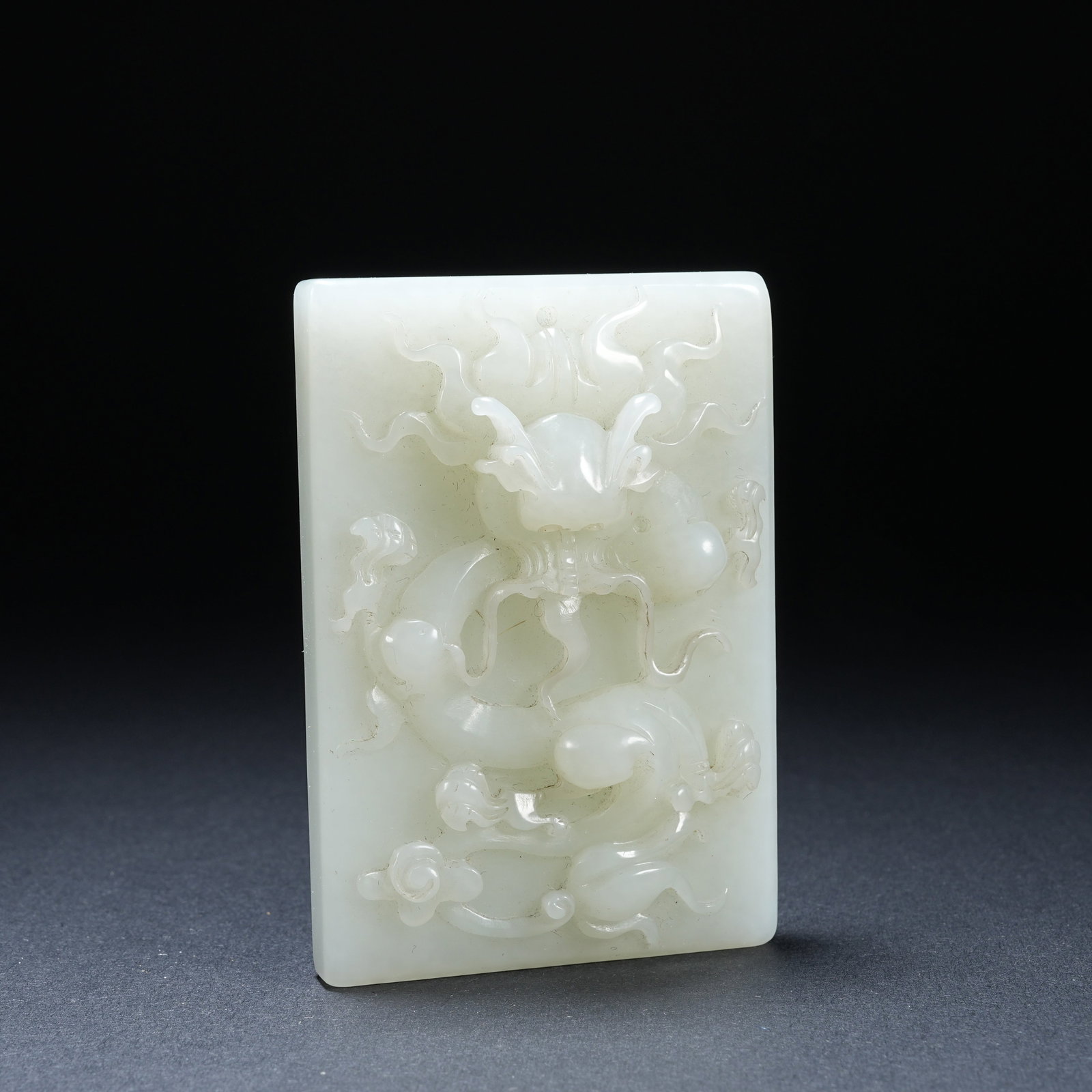 A HETIAN JADE HIGH-RELIEF CHILONG PATTERN PLAQUE: Hetian Jade High-relief Chilong Pattern Plaque