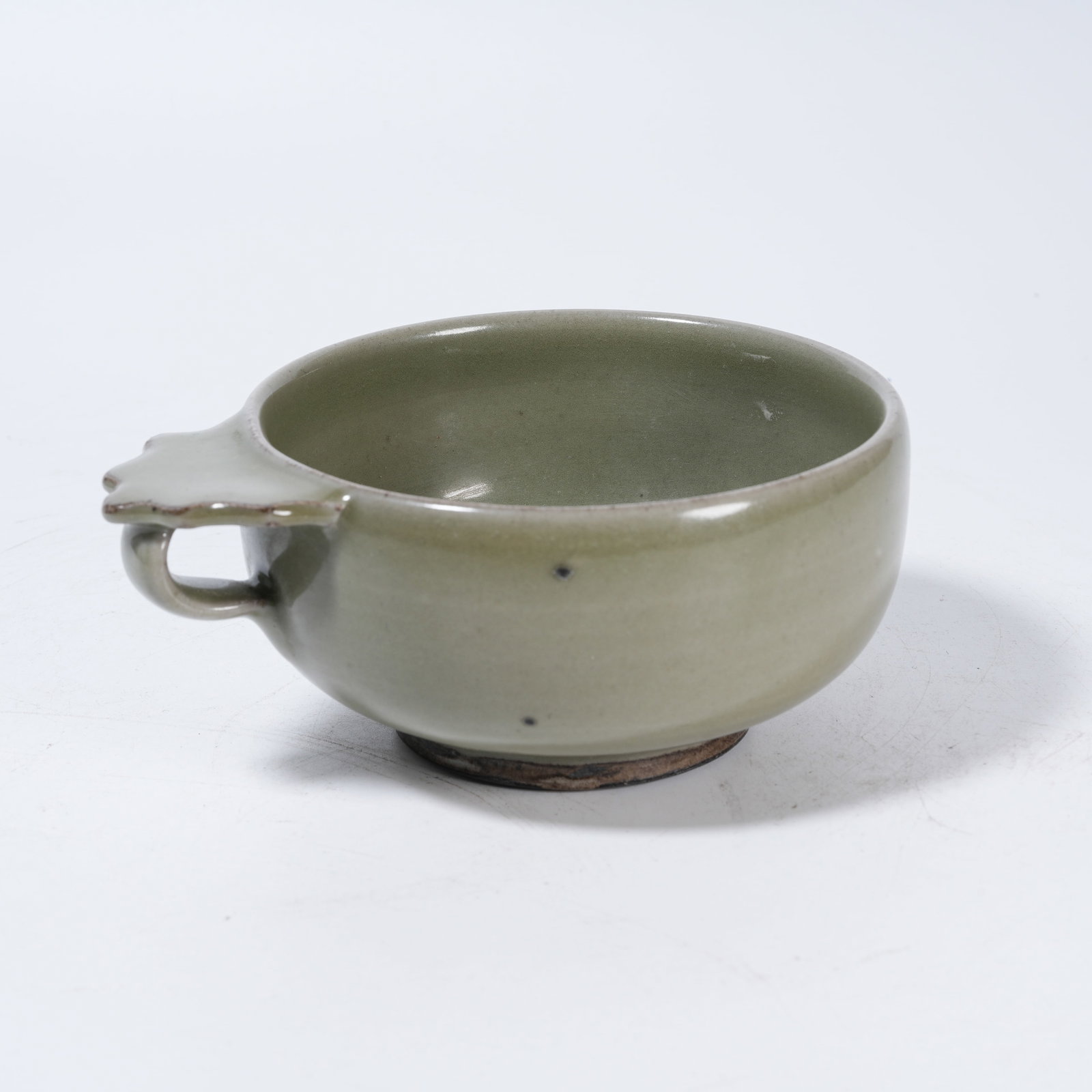 A CELADON HANDLED CUP (1 of 9)