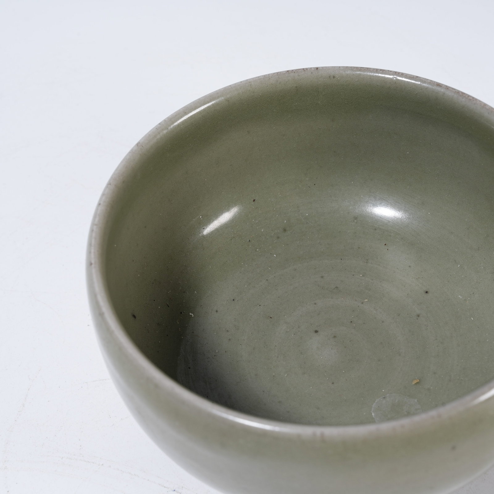 A CELADON HANDLED CUP - 6