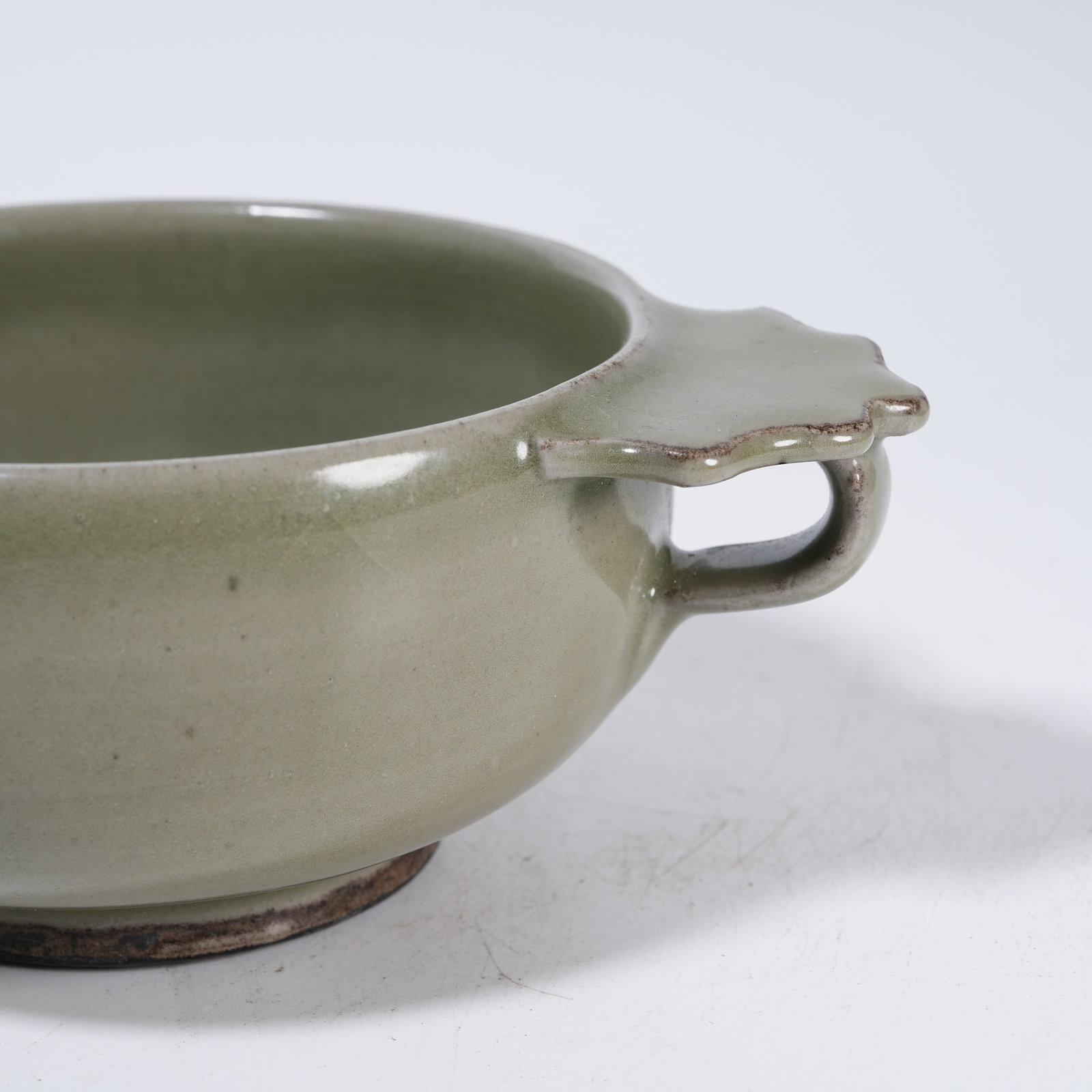 A CELADON HANDLED CUP - 8
