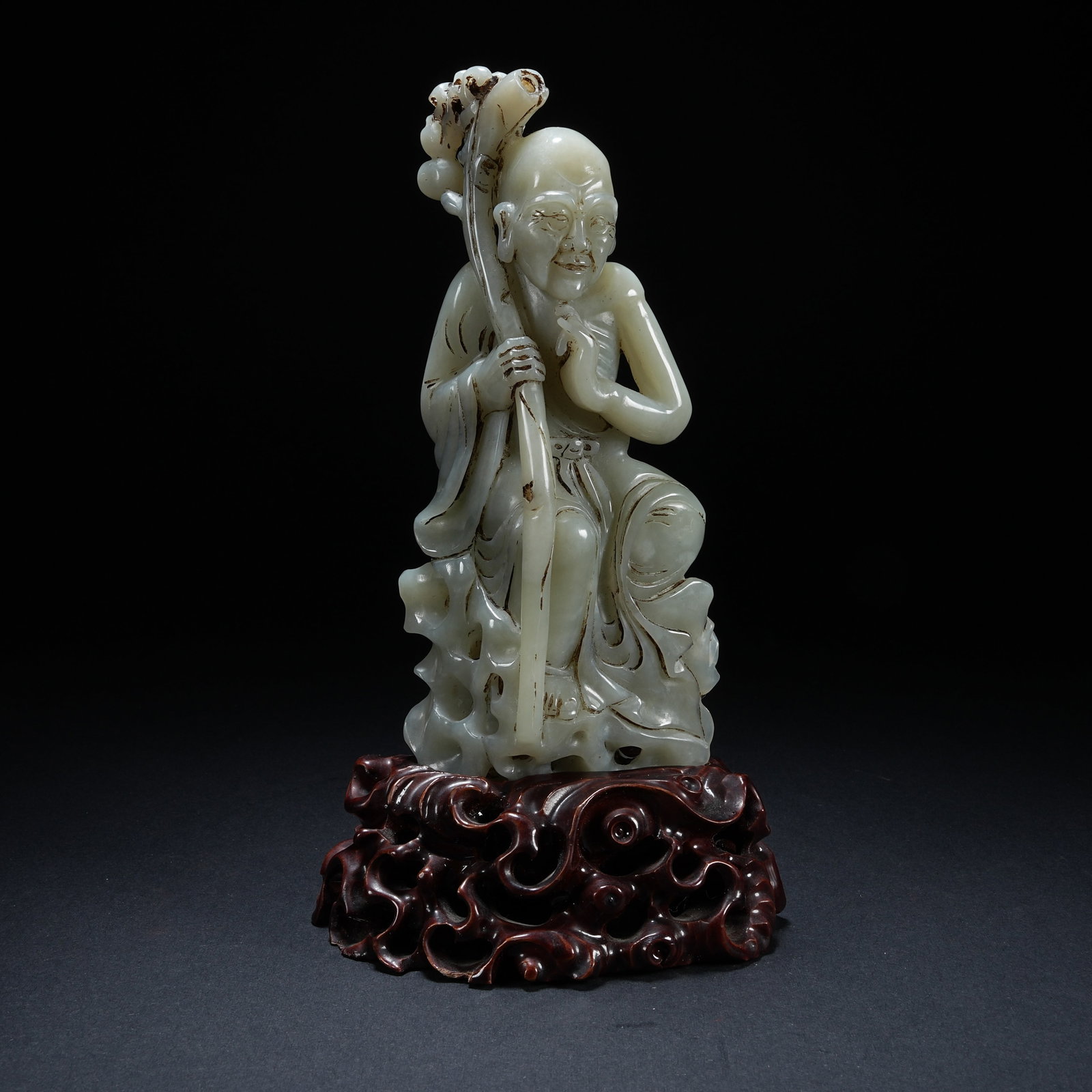 A HETIAN JADE GOD OF LONGEVITY ORNAMENT: Hetian Jade God of Longevity Ornament