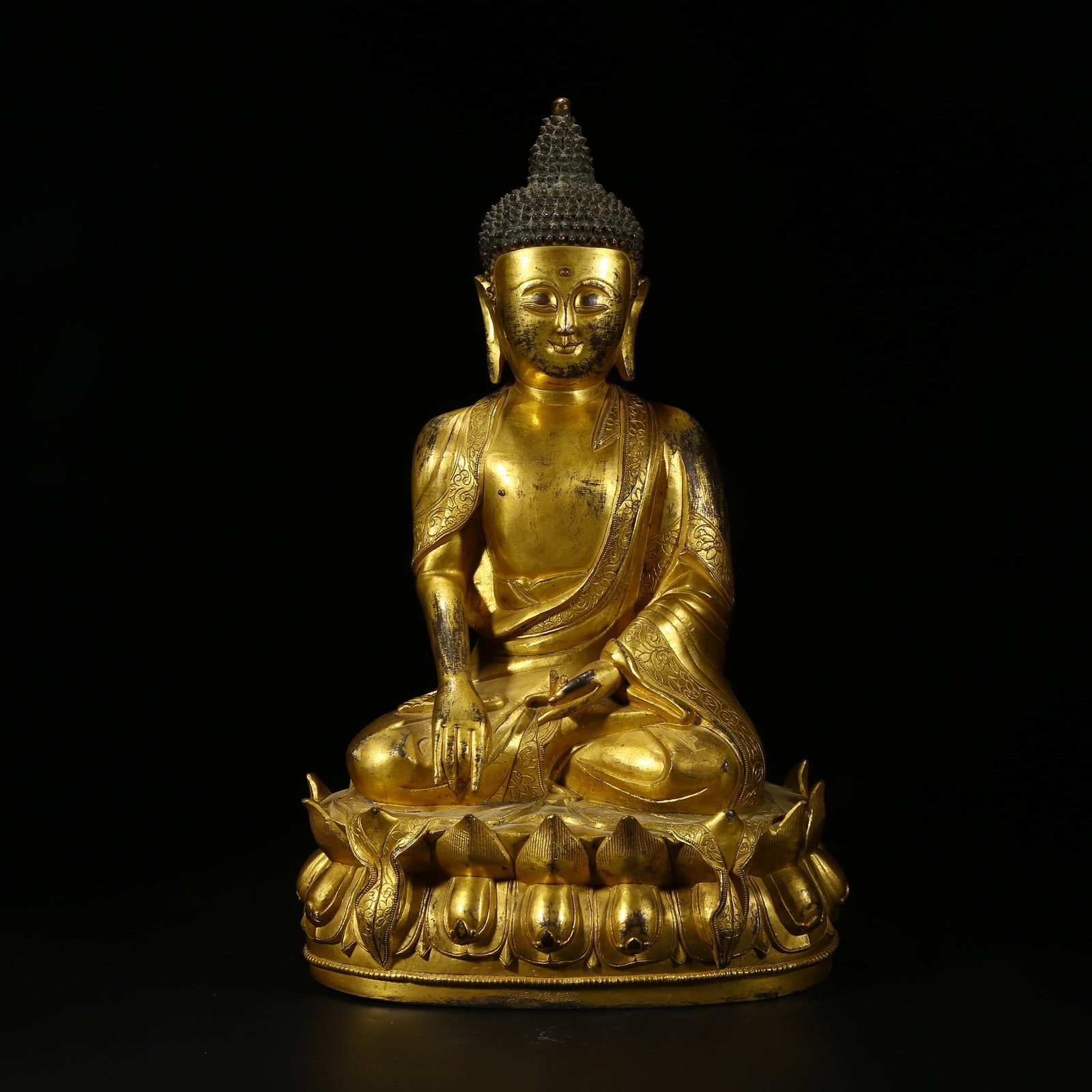 A GILDED BRONZE STATUE OF SHAKYAMUNI BUDDHA: Gilded Bronze Statue of Shakyamuni Buddha