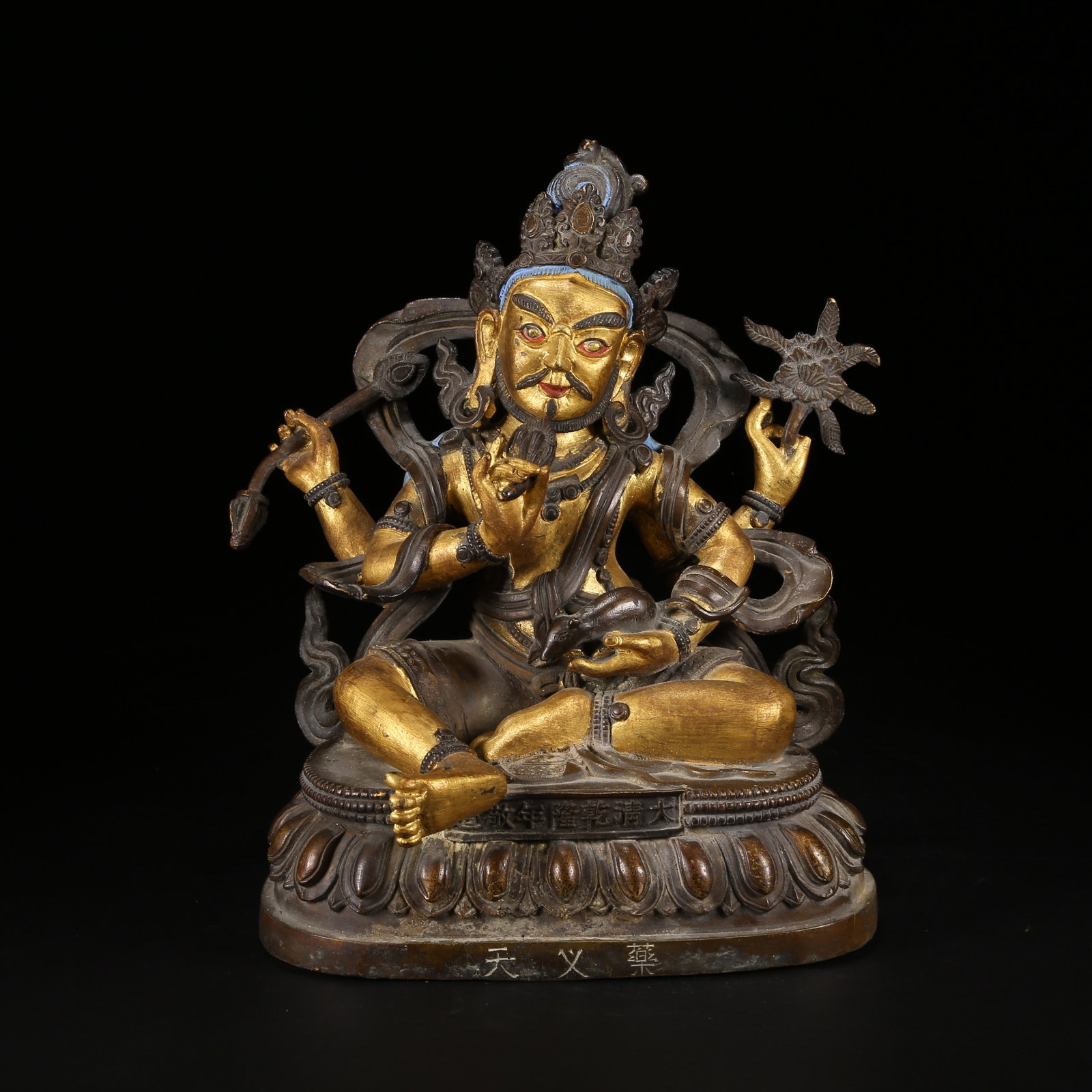 A GILT AND BRONZE ALLOY SIX-TIERED BUDDHIST TOWER STYLE YAKSHA GOD OF WEALTH STATUE: Gilt and Bronze Alloy Six-Tiered Buddhist Tower Style Yaksha God of Wealth Statue