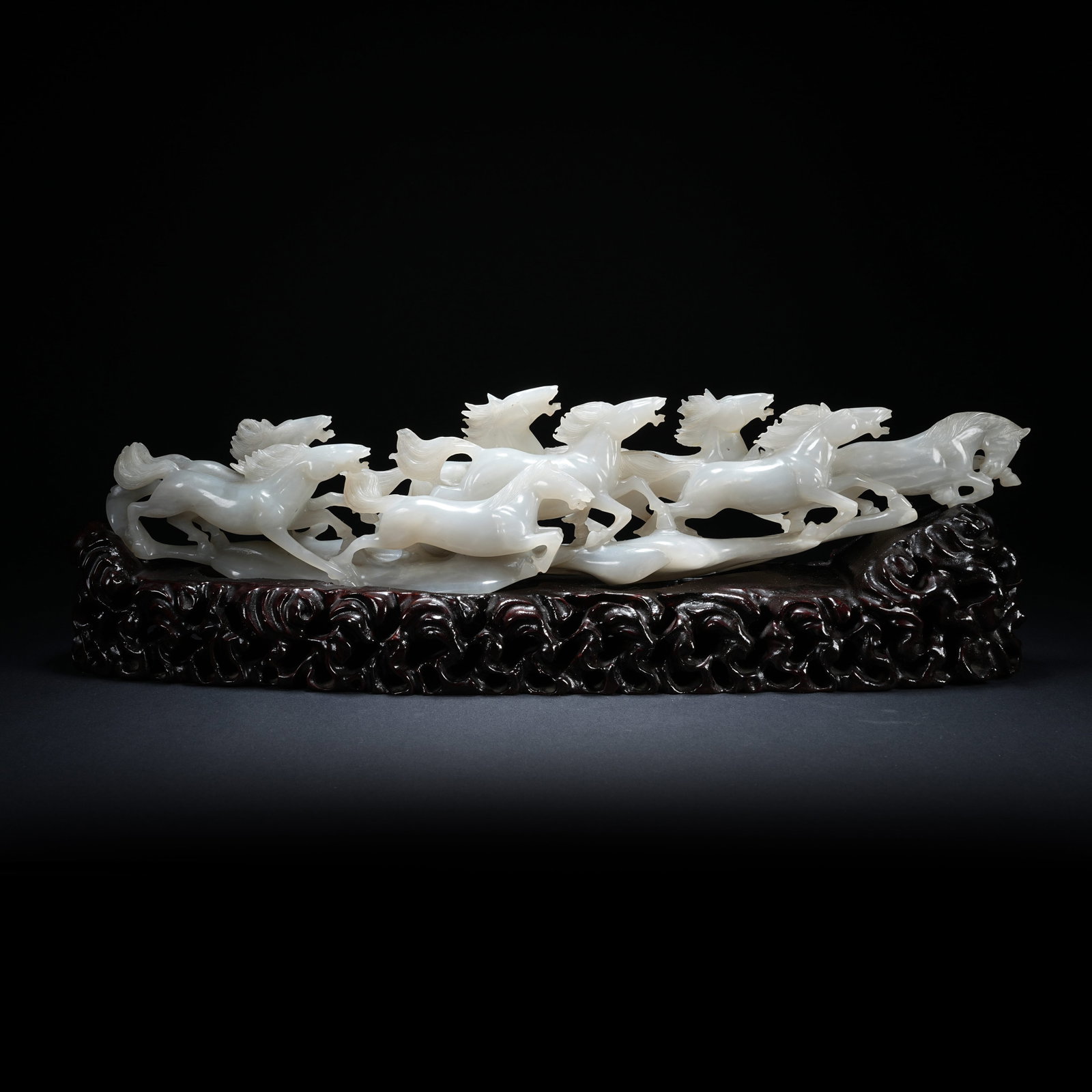 A HETIAN JADE EIGHT STEEDS ORNAMENT: Hetian Jade Eight Steeds Ornament