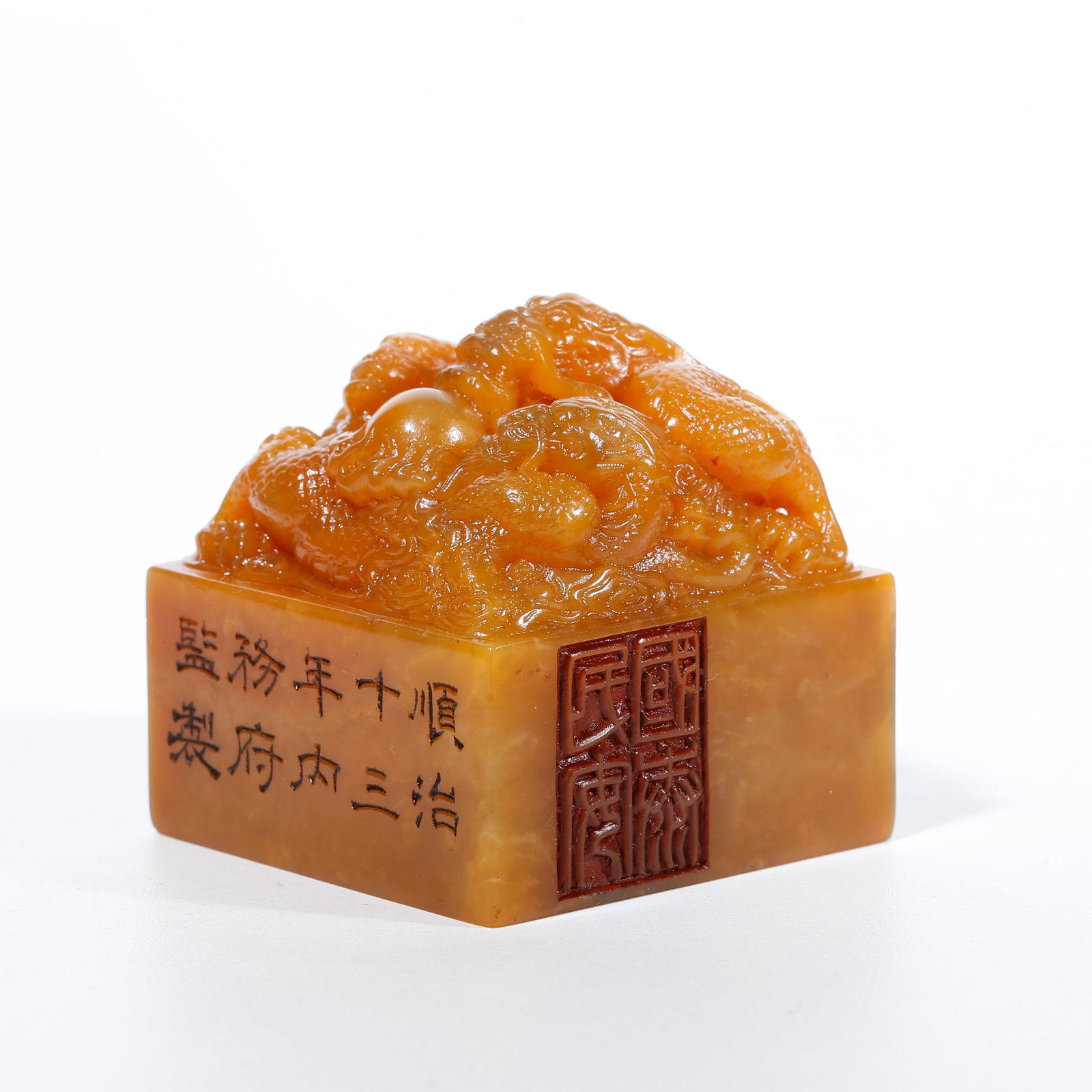 A THREE-DRAGON PATTERN SEAL CARVED FROM SHOUSHAN TIANHUANG STONE: Three-Dragon Pattern Seal Carved from Shoushan Tianhuang Stone