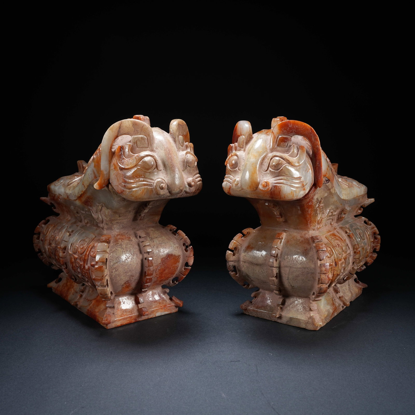 A SET OF ANCIENT JADE ZUN VESSELS WITH BEAST MASK AND PHOENIX PATTERNS: Set of Ancient Jade Zun Vessels with Beast Mask and Phoenix Patterns