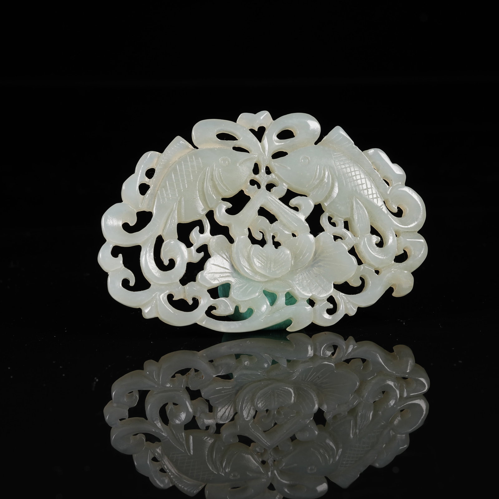 A HETIAN JADE BELT ORNAMENT WITH FISH MOTIFS FOR ABUNDANCE YEAR AFTER YEAR: Hetian Jade Belt Ornament with Fish Motifs for Abundance Year after Year