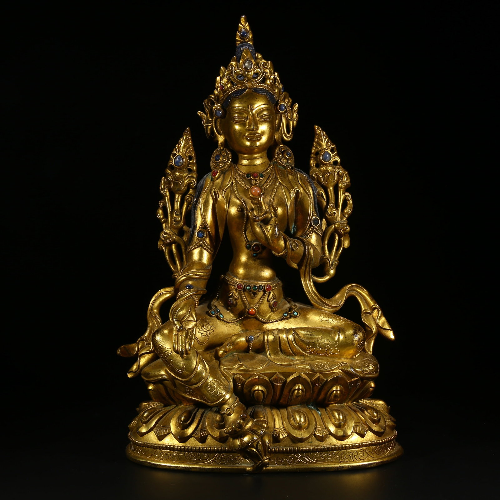 A GILDED BRONZE STATUE OF GREEN TARA INLAID WITH GEMSTONES: Gilded Bronze Statue of Green Tara Inlaid with Gemstones