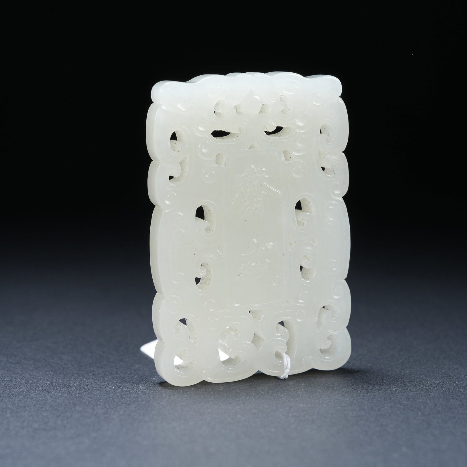 A HETIAN JADE OPENWORK CARVED FASTING PLAQUE: Hetian Jade Openwork Carved Fasting Plaque