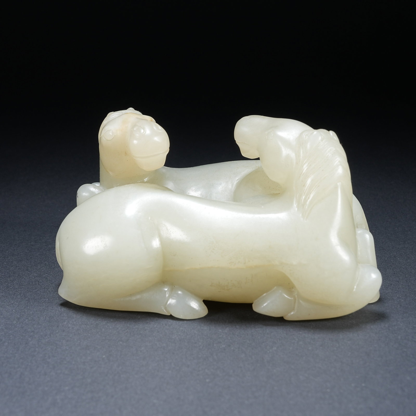 A HETIAN JADE DOUBLE HORSE ORNAMENT: Hetian Jade Double Horse Ornament
