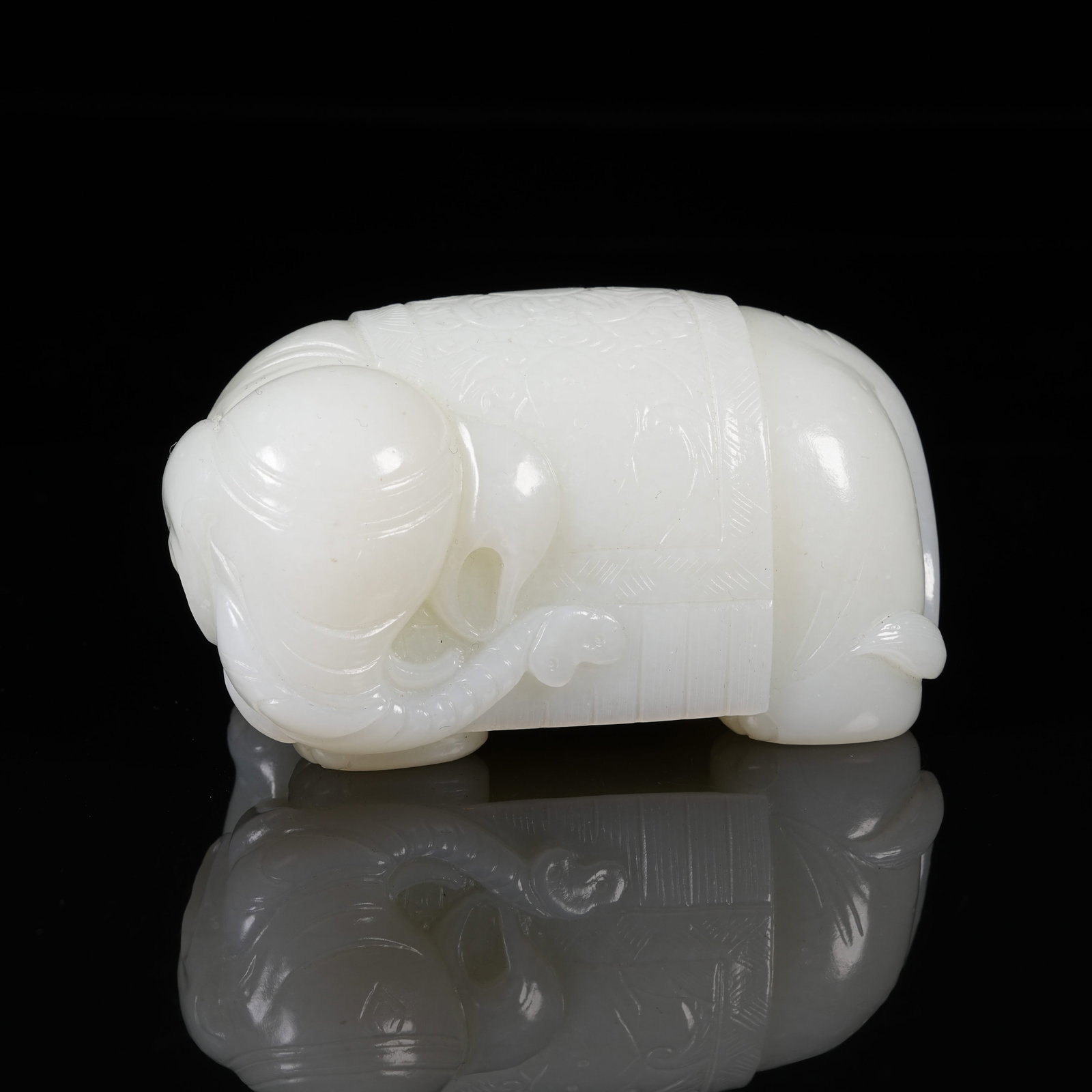 A WHITE HETIAN JADE ORNAMENT OF PEACE ELEPHANT (1 of 9)