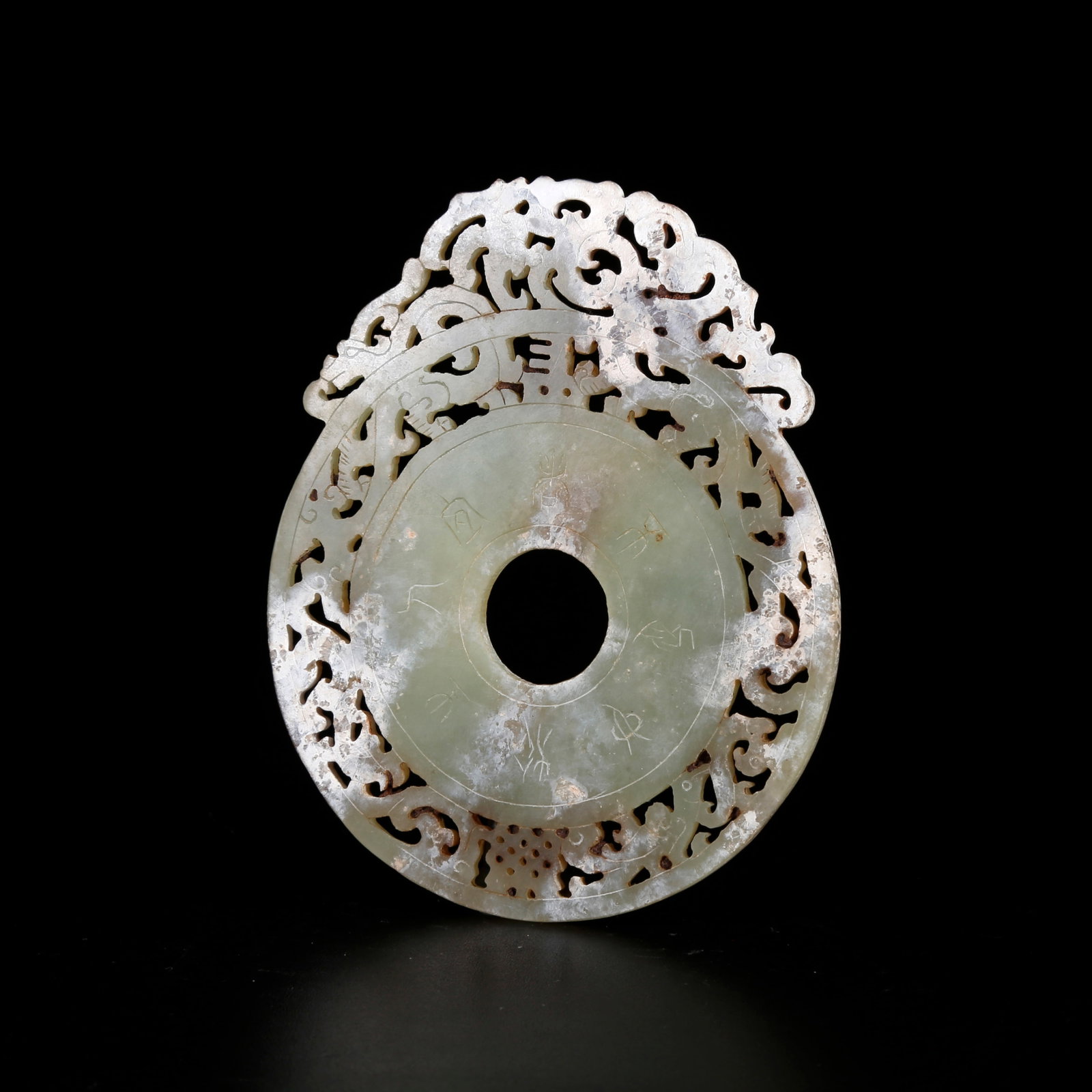 A ANCIENT JADE BI DISC WITH OUTER CARVINGS (1 of 10)