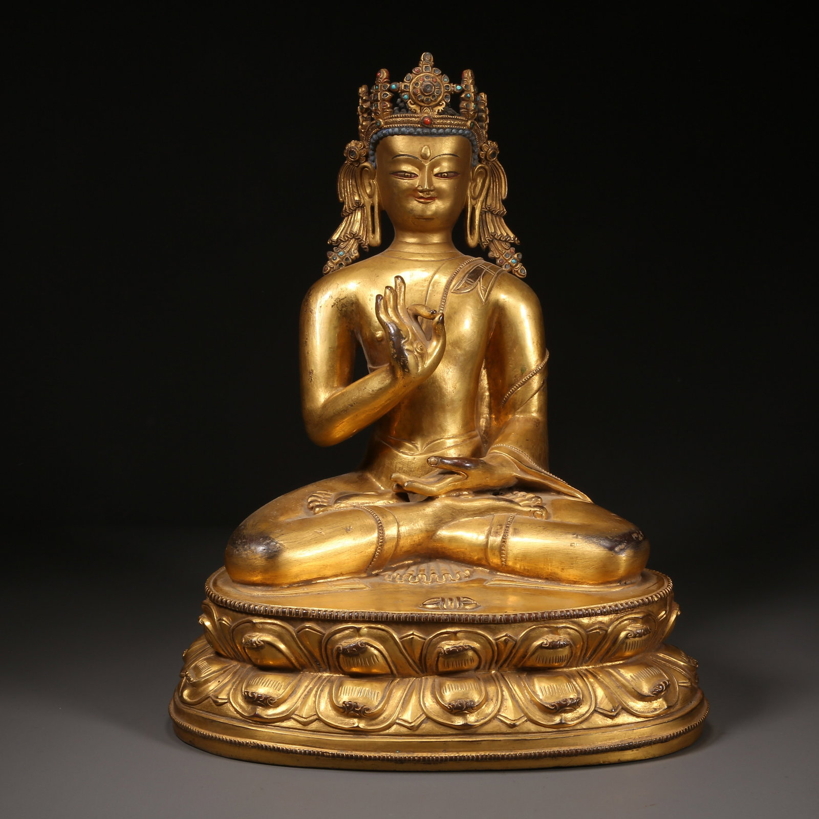 A GILT-BRONZE SHAKYAMUNI BUDDHA PREACHING STATUE (1 of 8)