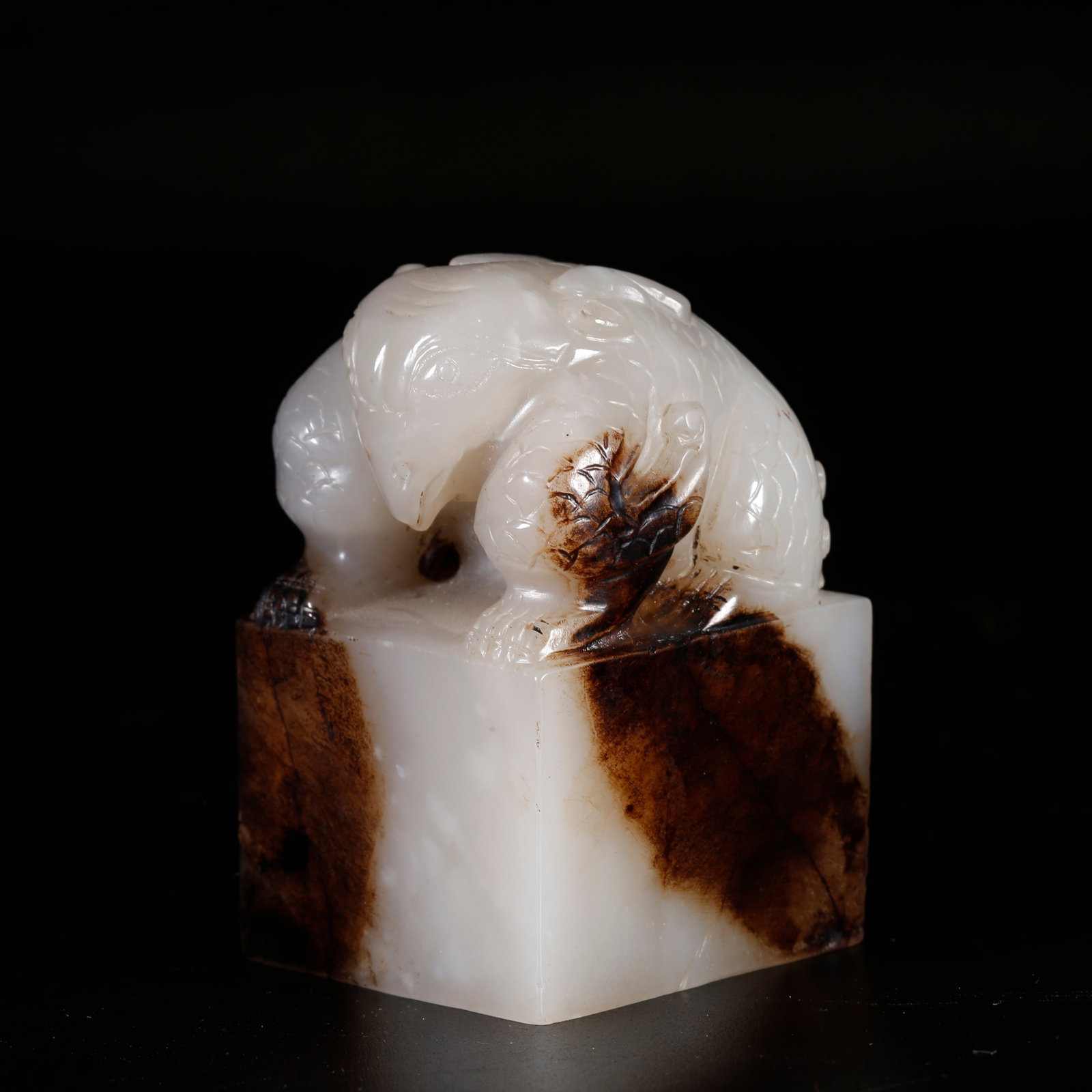 A HETIAN JADE SEAL WITH CARVED BEAST KNOB (1 of 9)