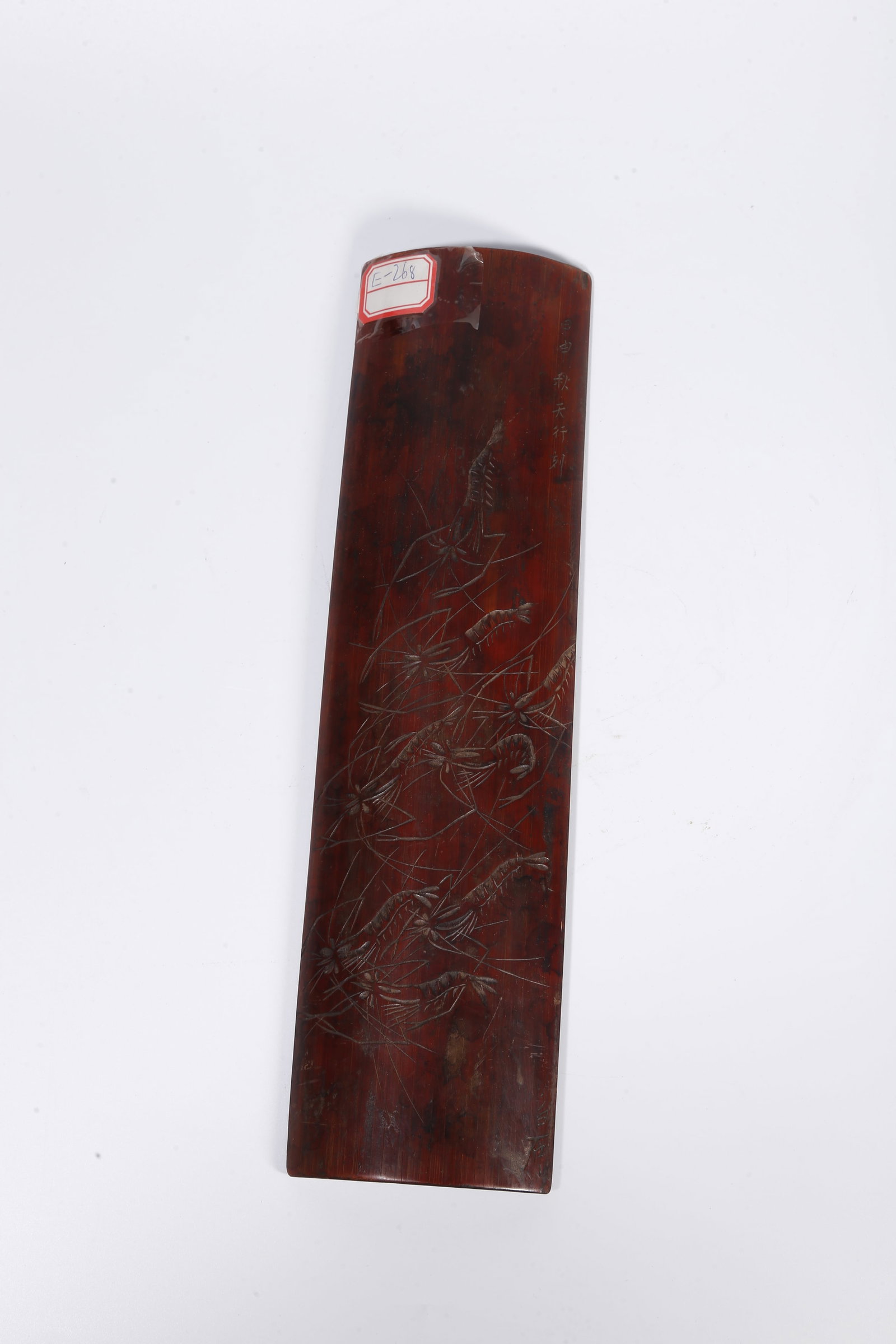 A BAMBOO WRIST REST CARVED WITH SHRIMP PATTERNS (1 of 9)