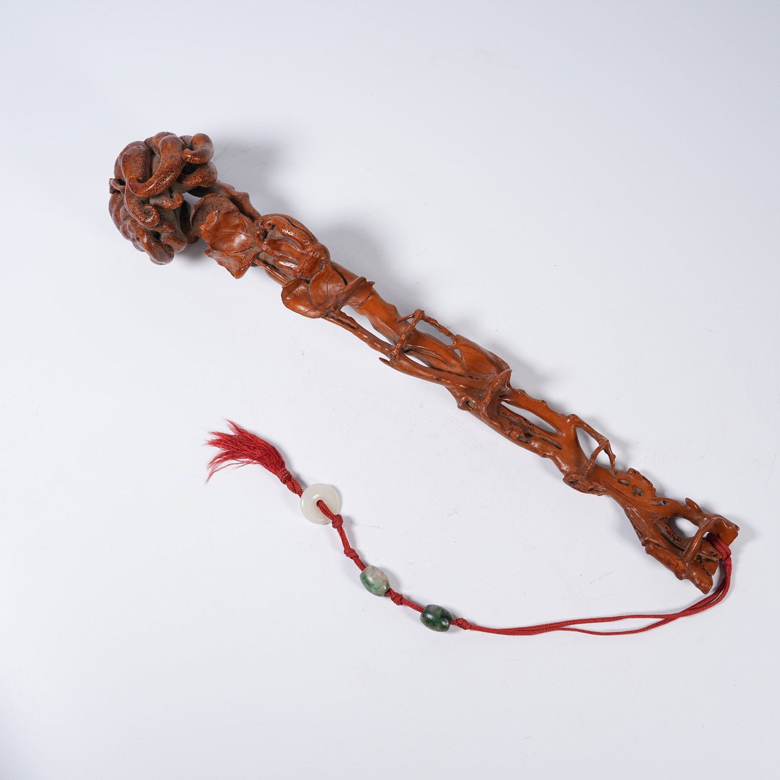 A BAMBOO RUYI SCEPTER CARVED INTO BERGAMOT FORM (1 of 9)