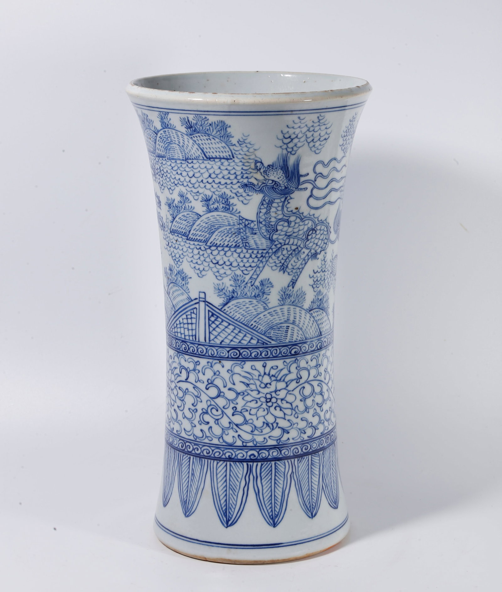 A BLUE AND WHITE GU VASE WITH QILIN AND PHOENIX PATTERNS: Blue and White Gu Vase with Qilin and Phoenix Patterns