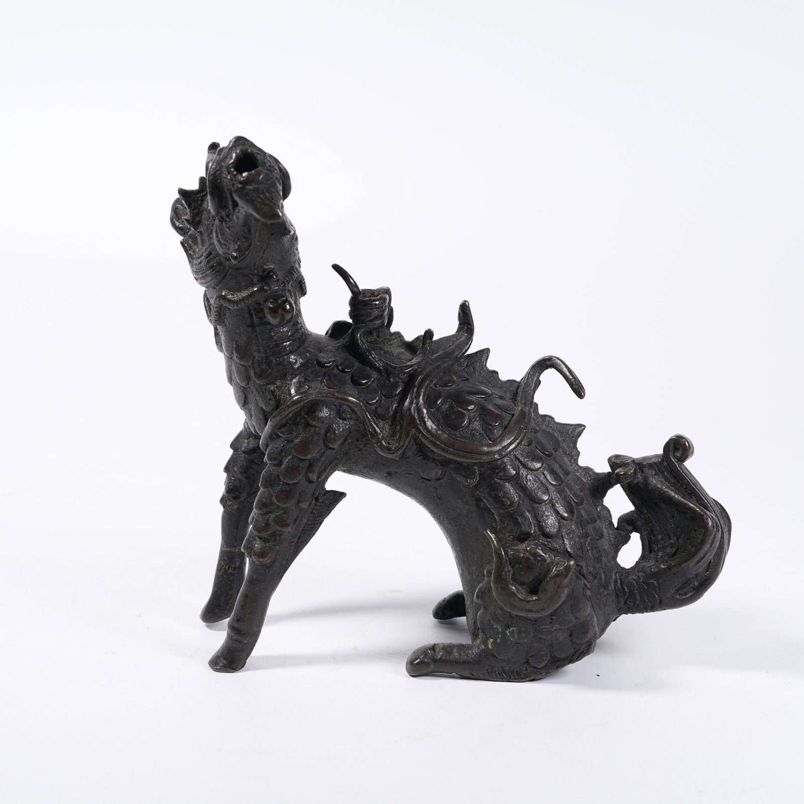 A BRONZE QILIN ORNAMENT (1 of 8)