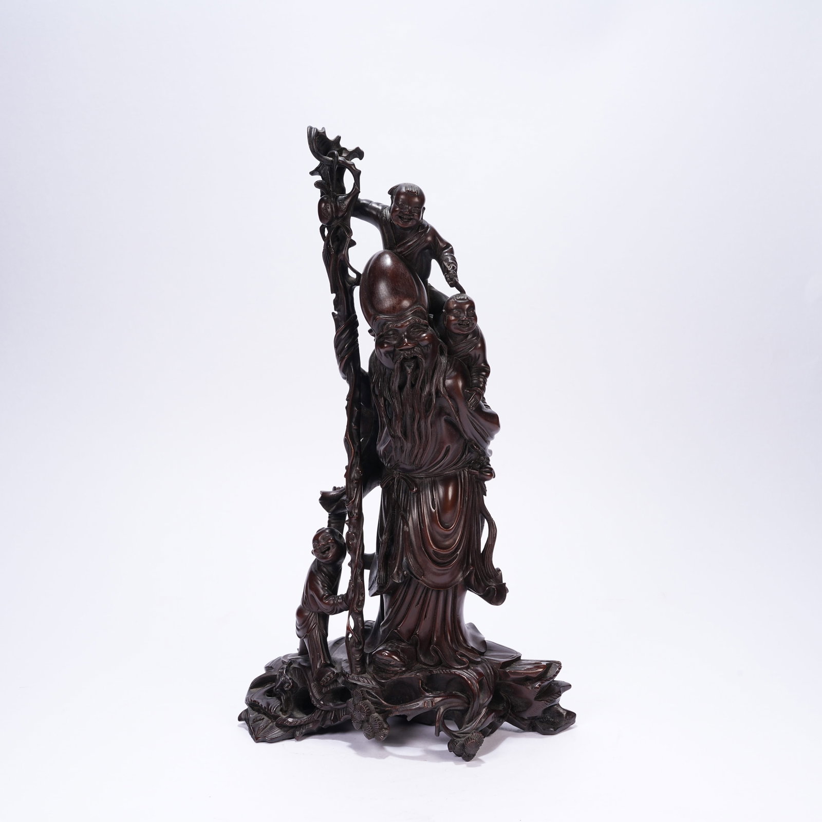 A RED SANDALWOOD STANDING FIGURE STATUE (1 of 10)