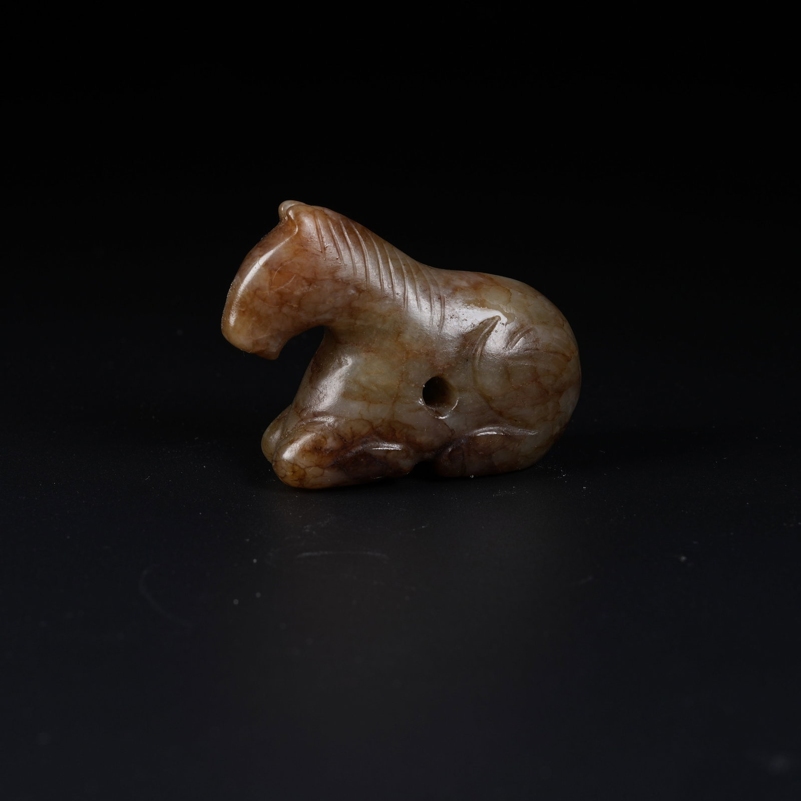 A ANCIENT JADE RECUMBENT HORSE ORNAMENT: Ancient Jade Recumbent Horse Ornament