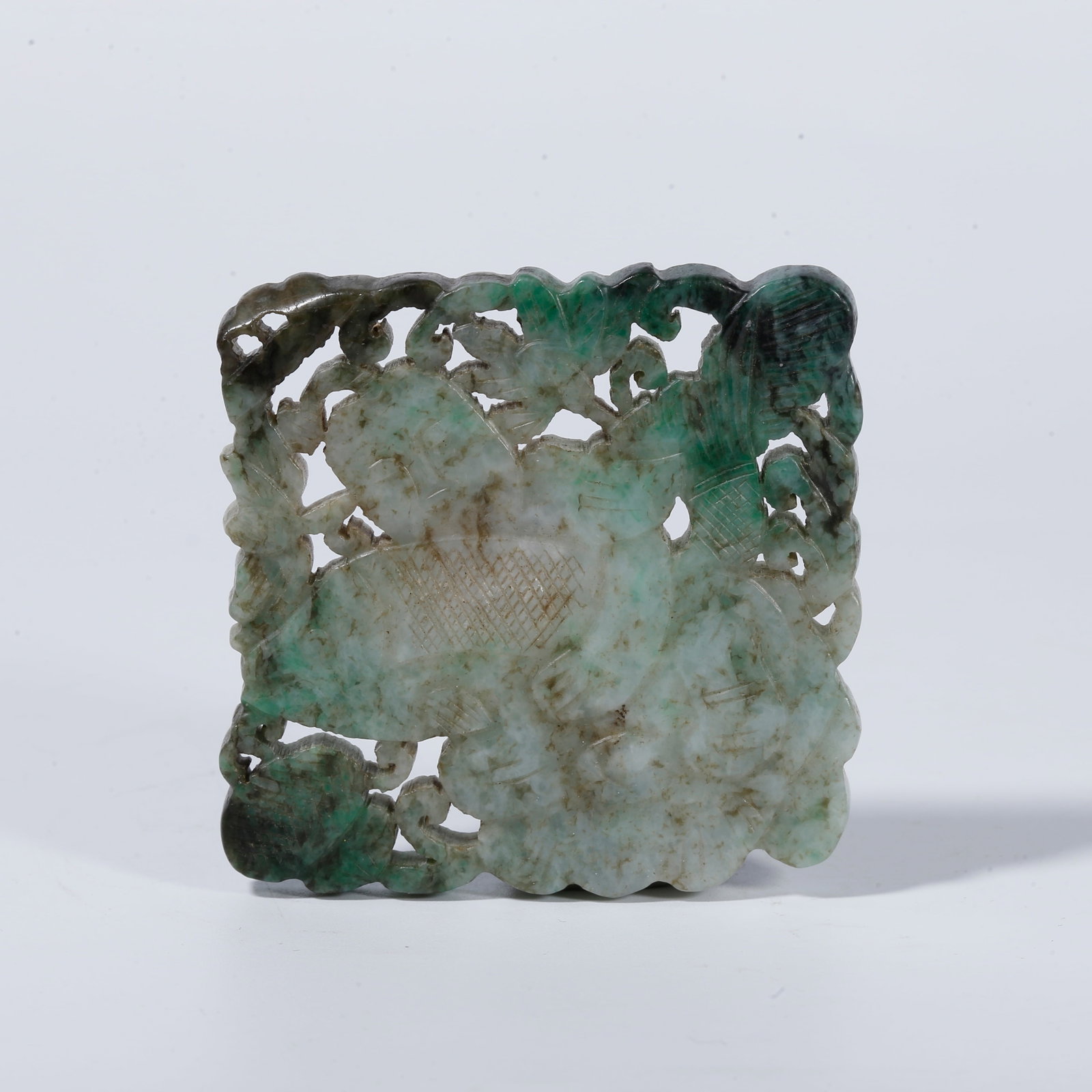 A JADEITE PENDANT CARVED WITH BOY AND FISH PATTERN: Jadeite Pendant Carved with Boy and Fish Pattern