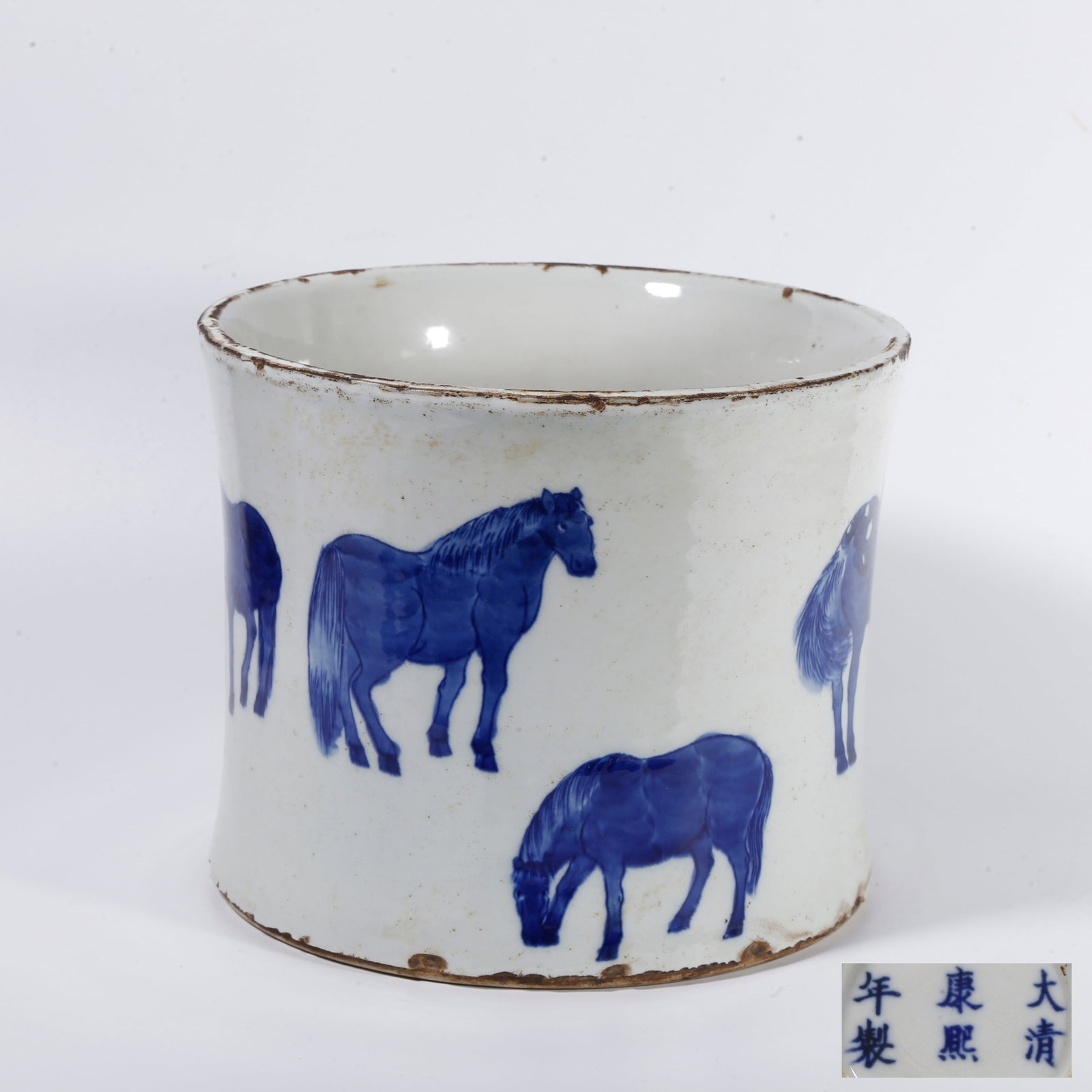 A BLUE AND WHITE BRUSH POT PAINTED WITH EIGHT HORSES: Blue and White Brush Pot Painted with Eight Horses