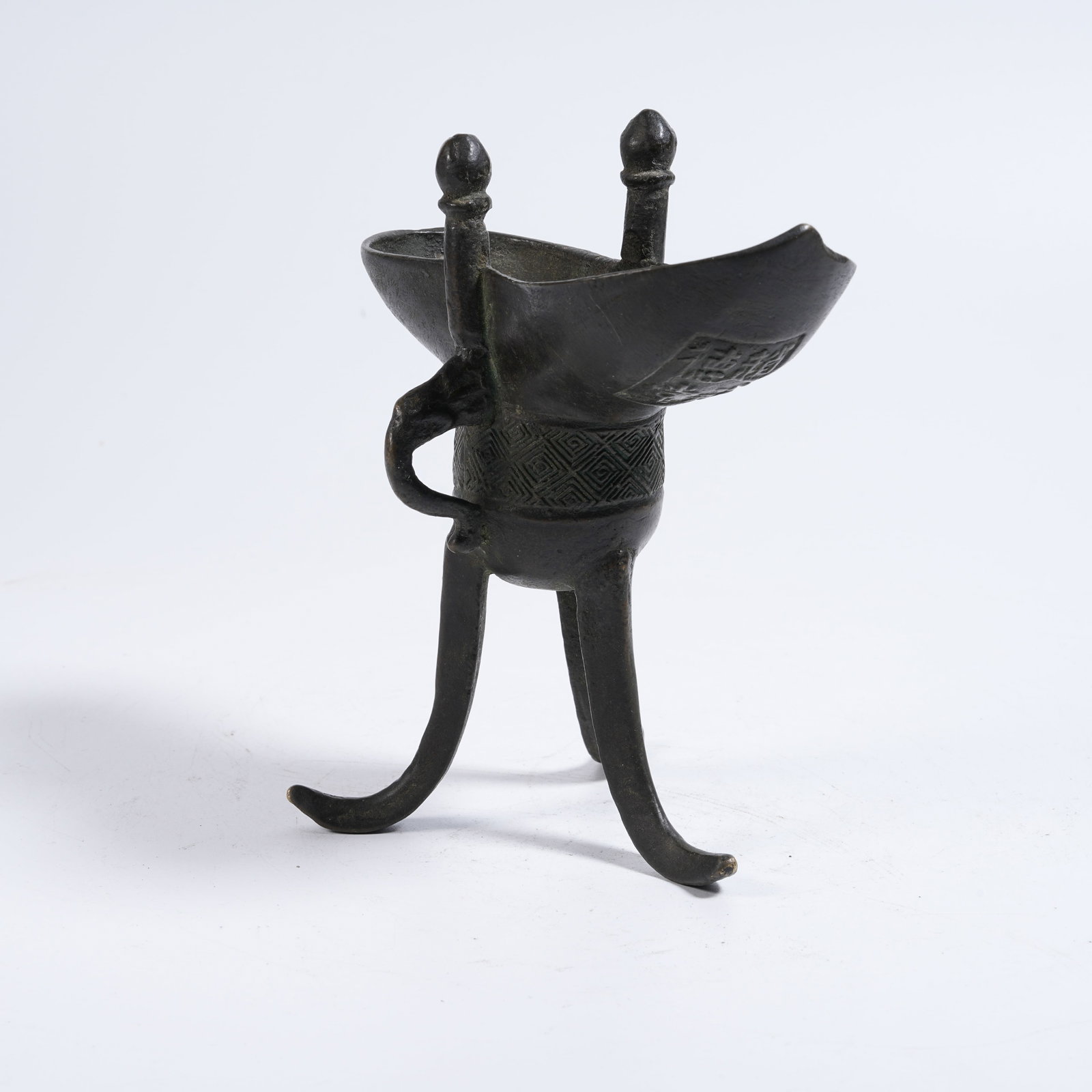 A BRONZE JUE CUP WITH BEAST EARS AND INSCRIBED CHARACTERS (1 of 8)