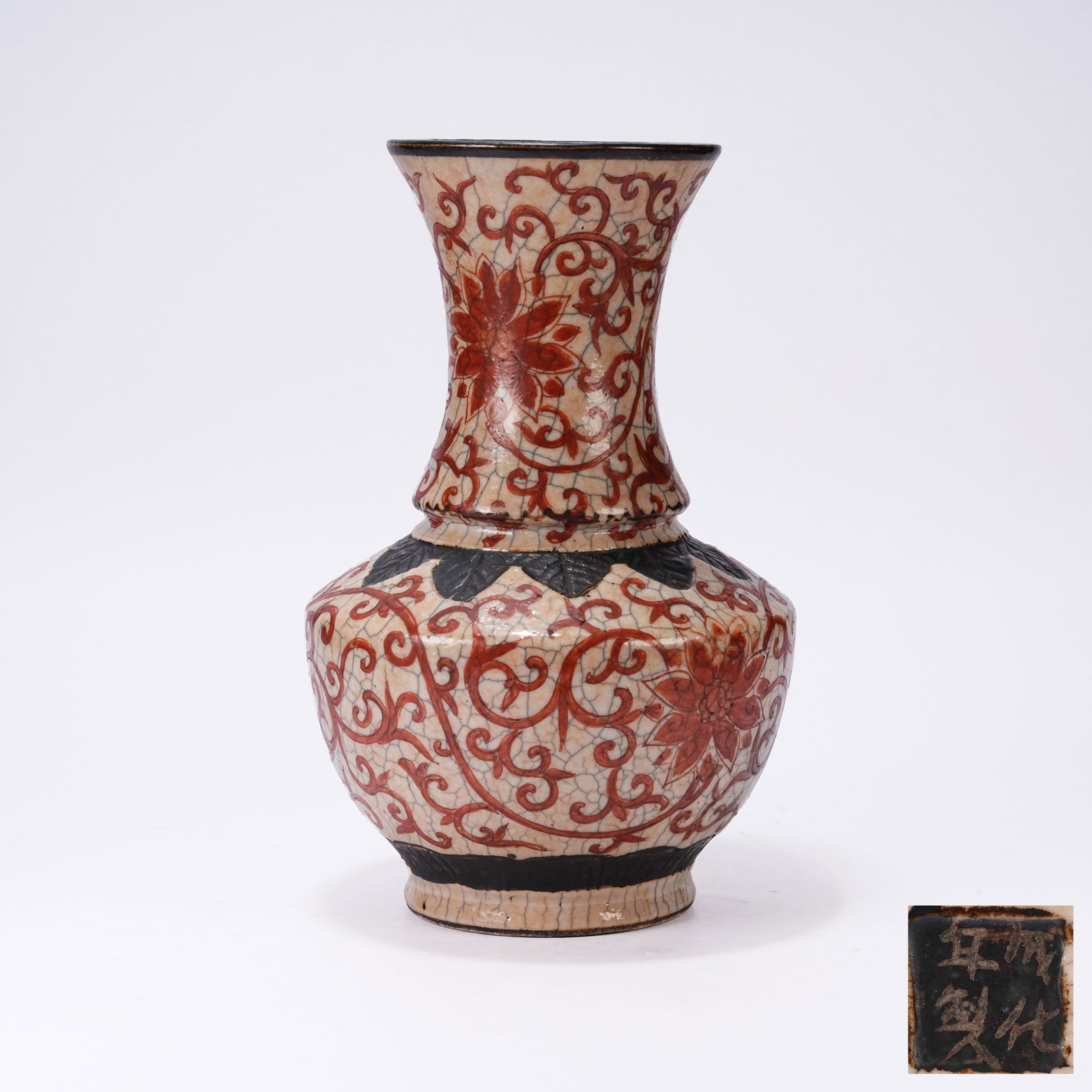 A IRON-RED PHOENIX-TAIL ZUN WITH INTERLOCKING LOTUS PATTERN (1 of 9)