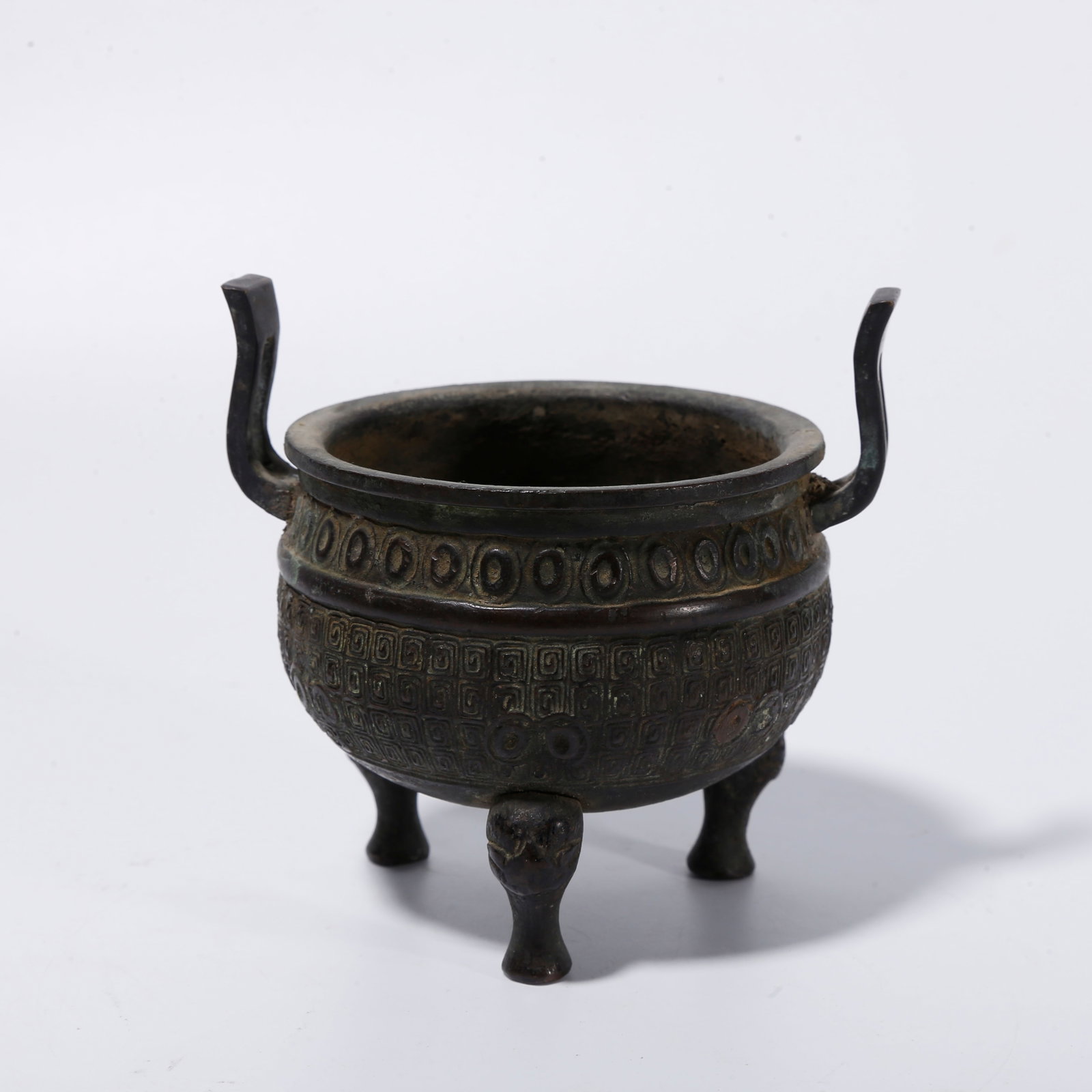 A BRONZE TRIPOD CENSER WITH UPRIGHT EARS (1 of 9)