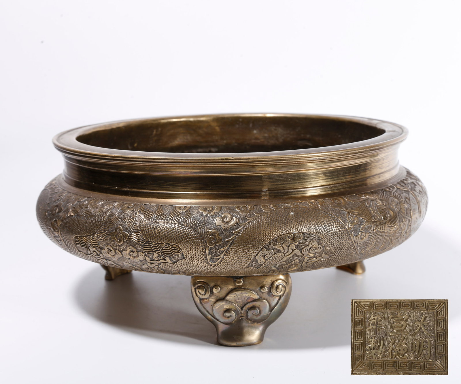 A BRONZE INCENSE CENSER WITH CLOUD AND DRAGON PATTERN: Bronze Incense Censer with Cloud and Dragon Pattern