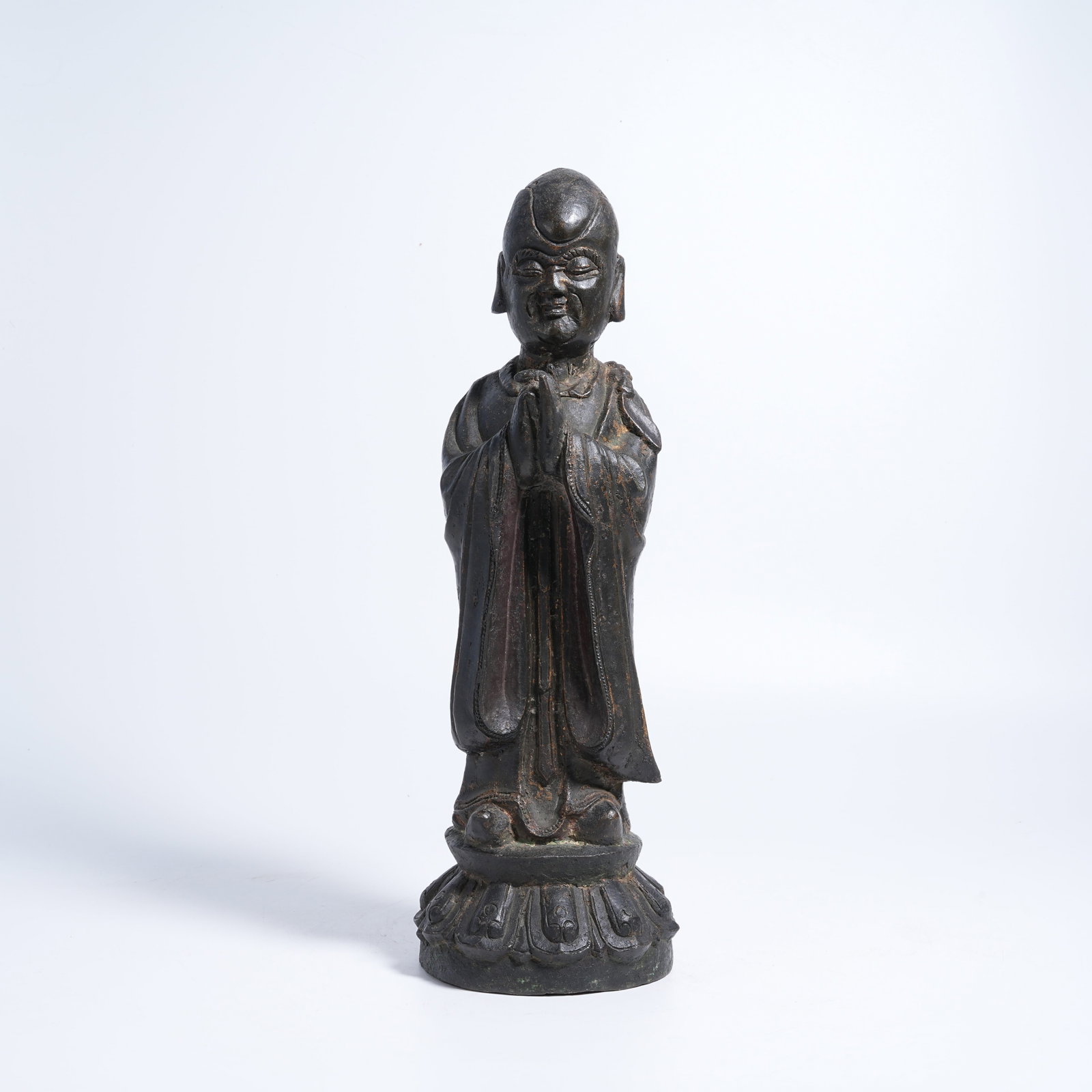 A BRONZE STANDING ARHAT STATUE (1 of 9)