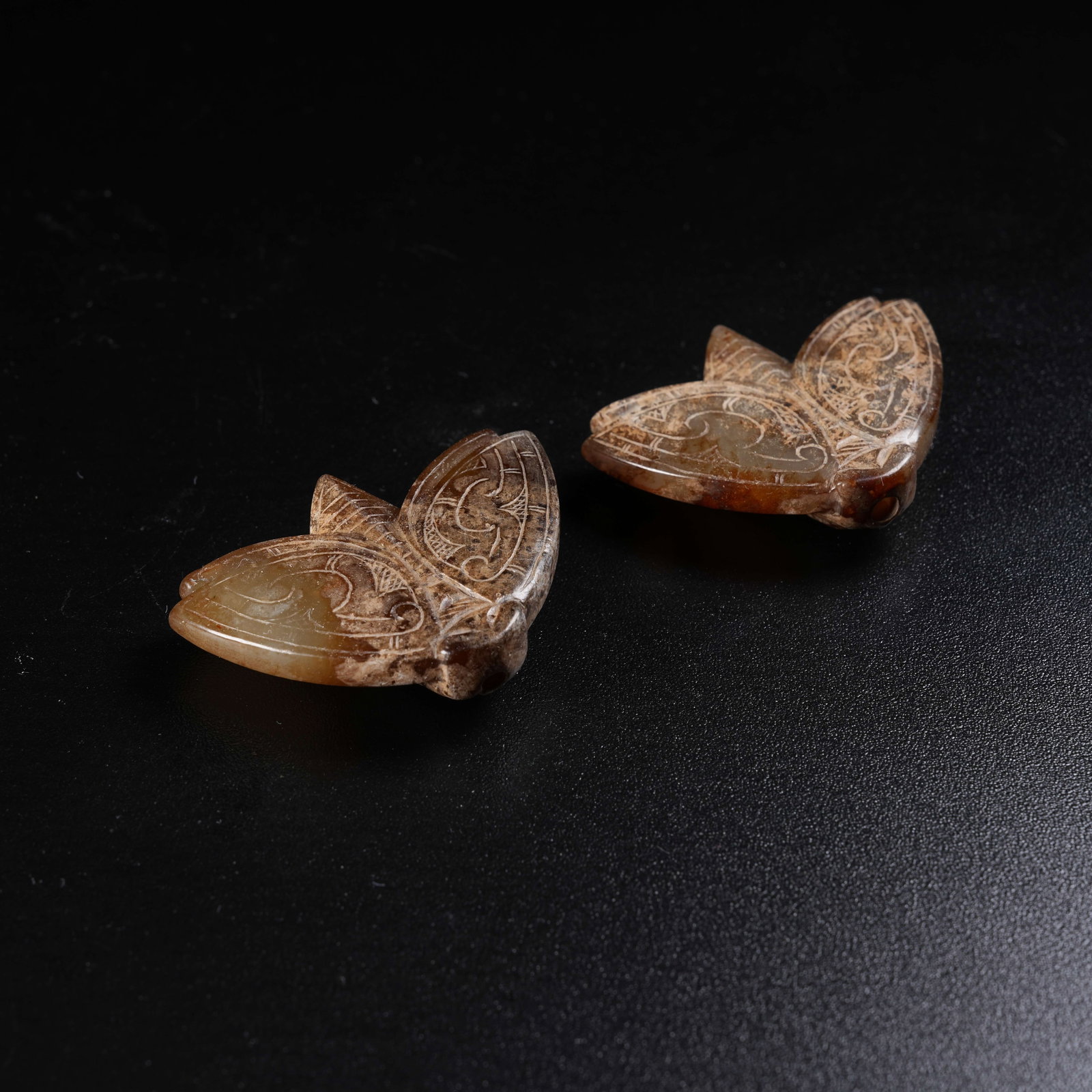 A SET OF ANCIENT JADE CICADA ORNAMENTS: Set of Ancient Jade Cicada Ornaments