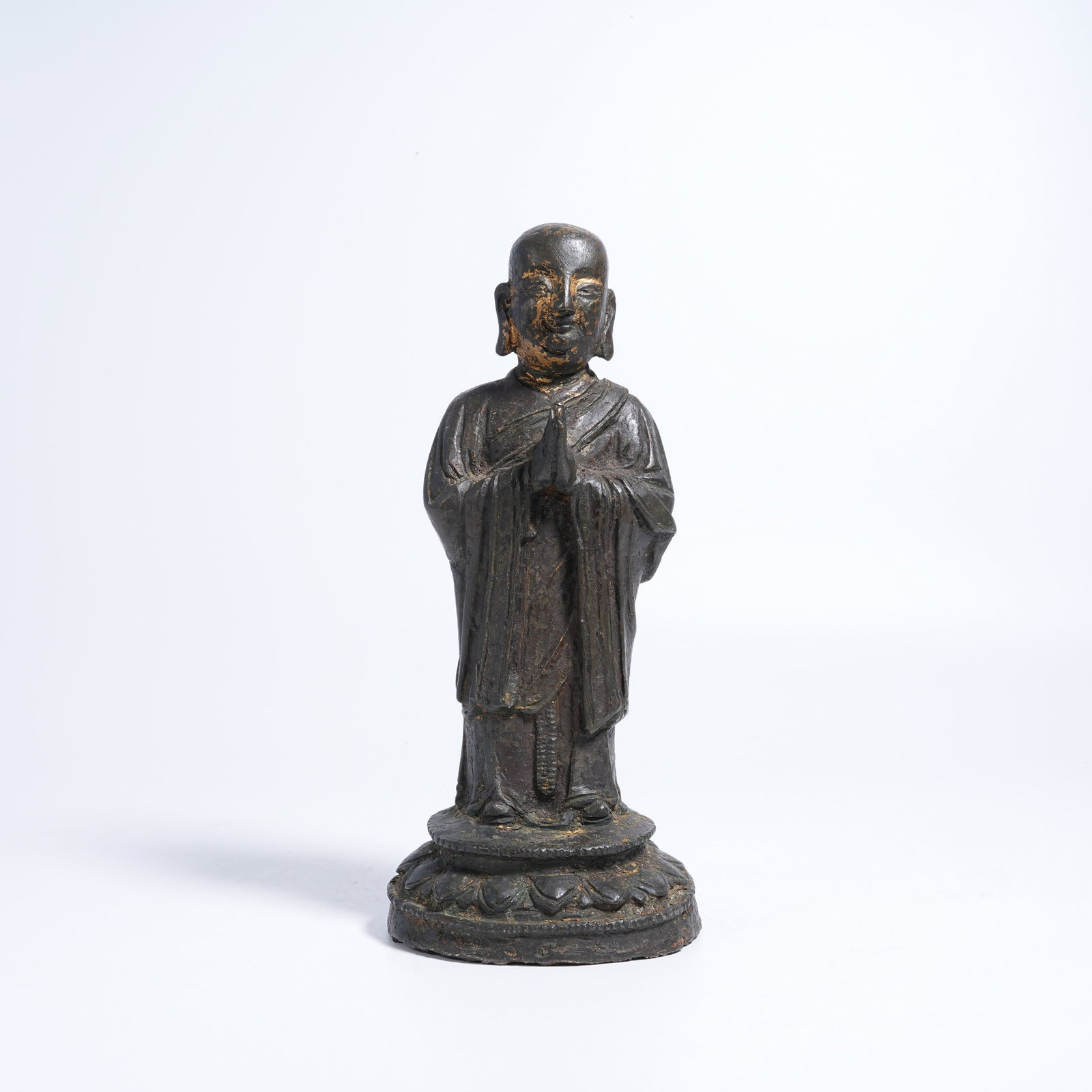 A BRONZE STANDING ARHAT STATUE (1 of 9)