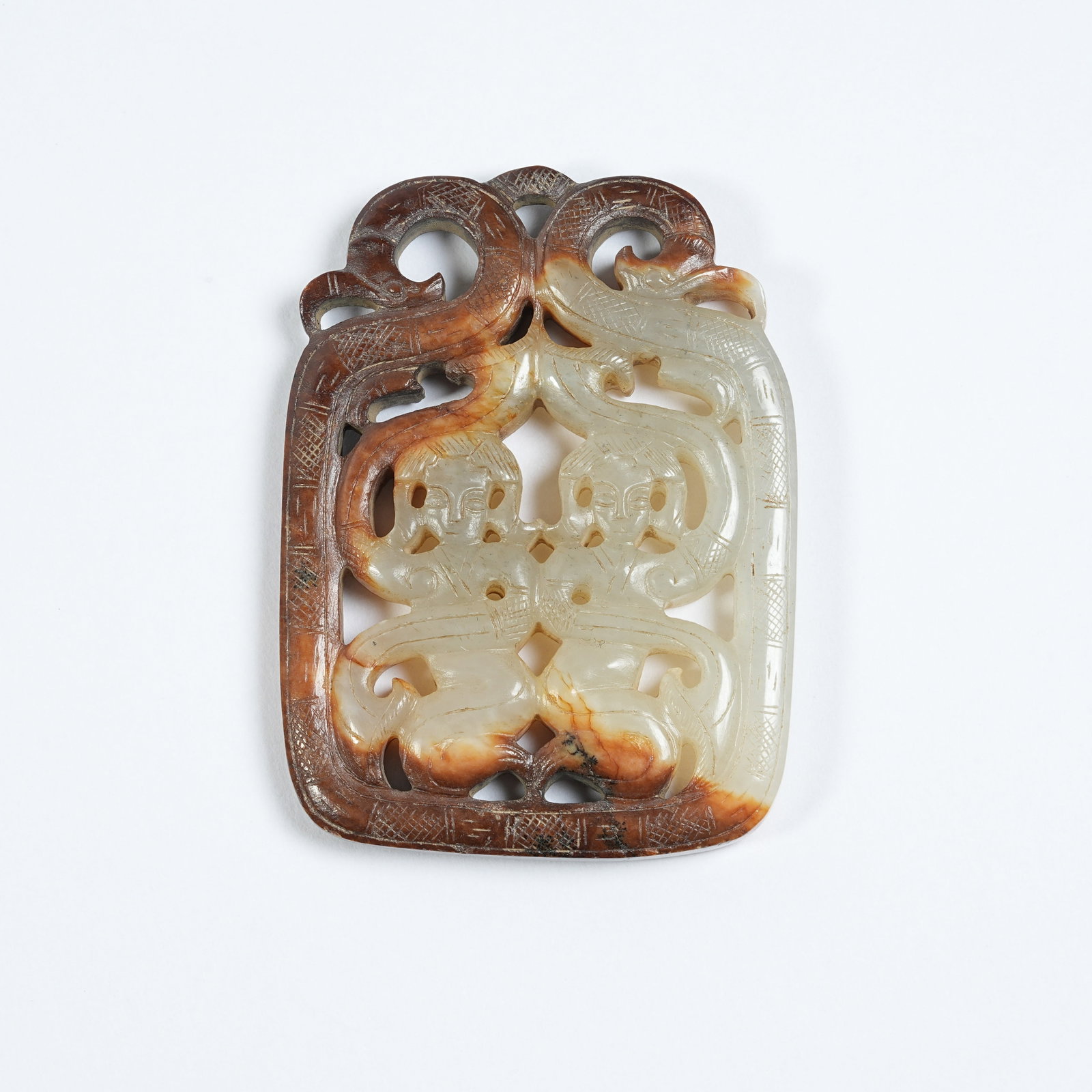 A ANCIENT JADE DANCING FIGURE PENDANT (1 of 8)