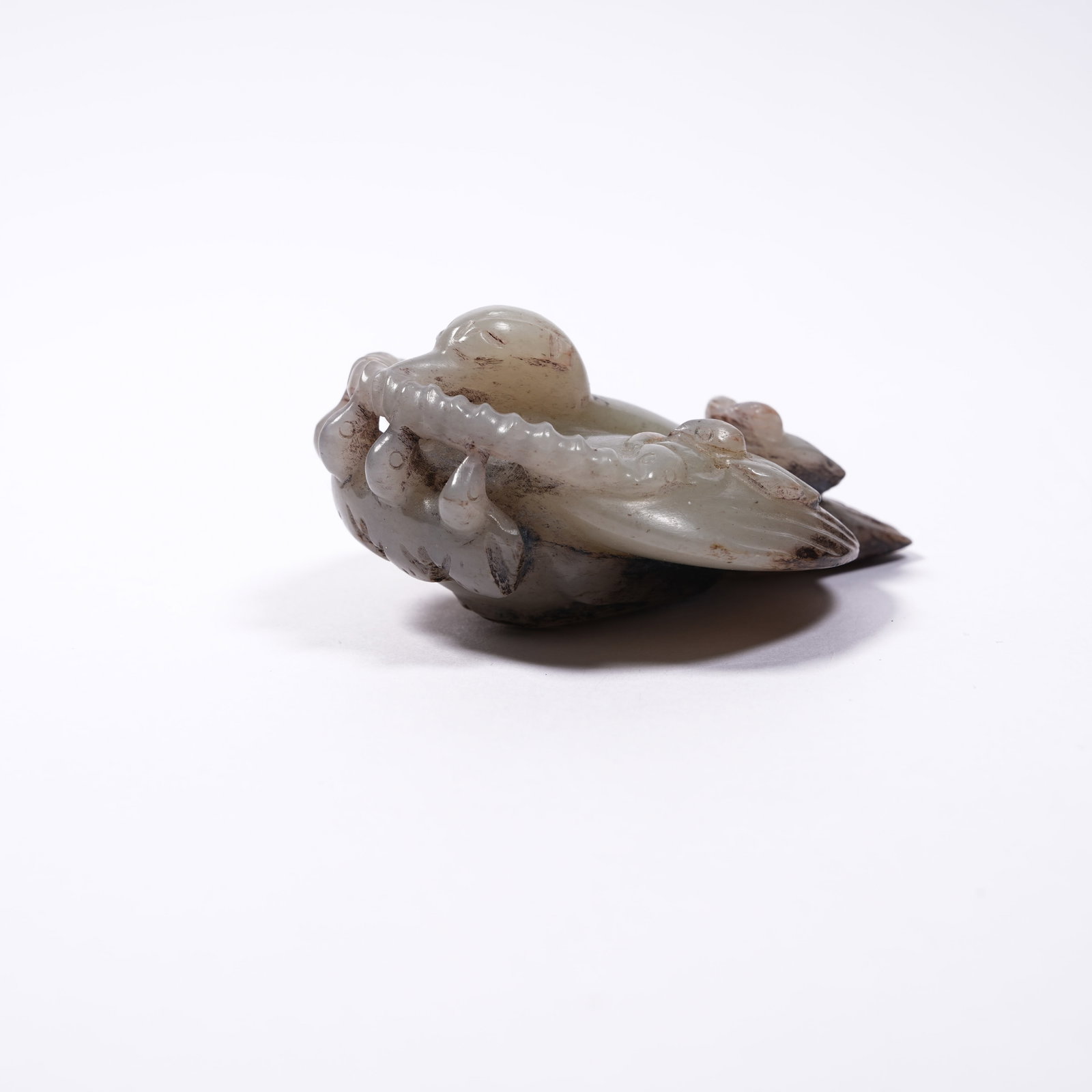 A ANCIENT JADE SWALLOW PENDANT: Ancient Jade Swallow Pendant