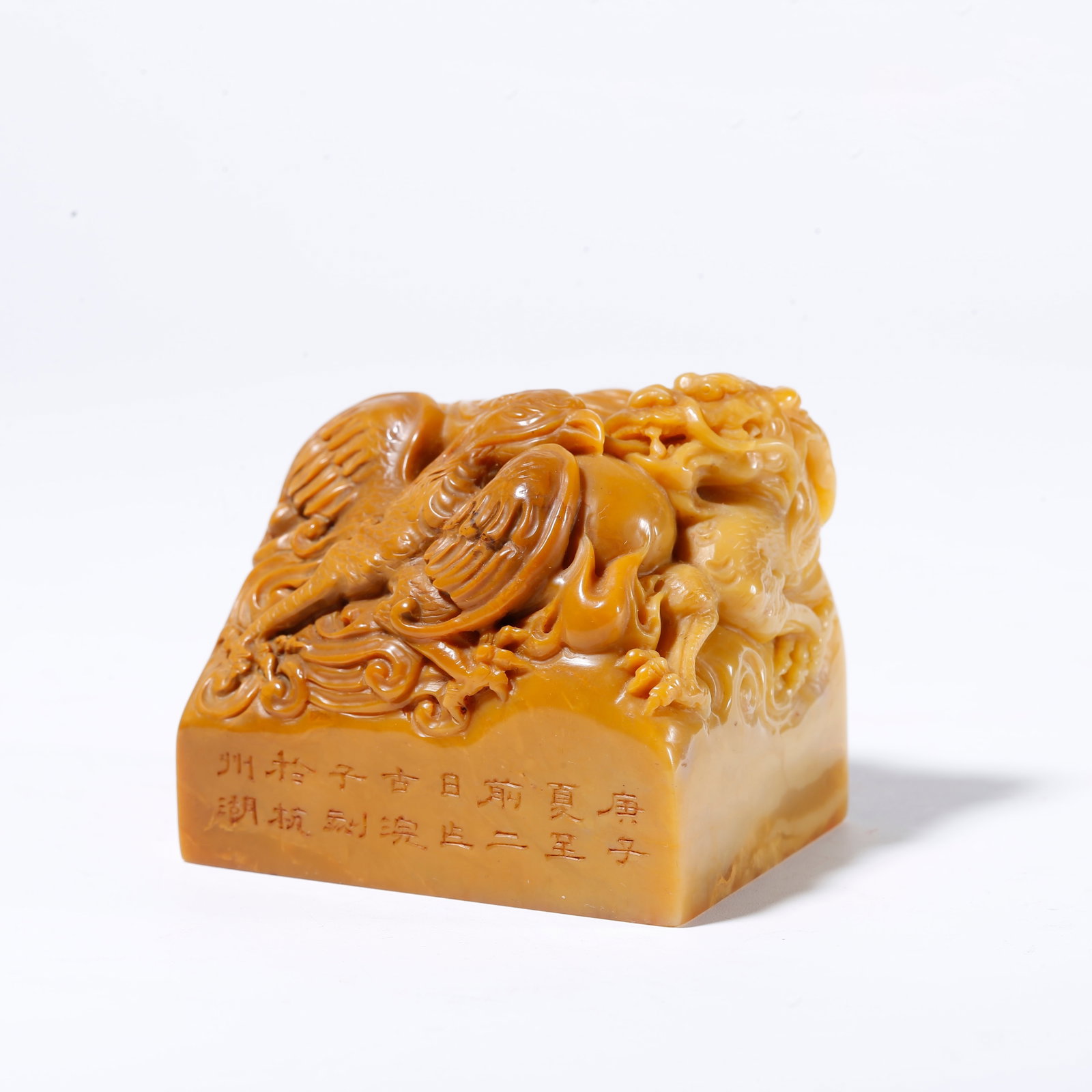 A SHOUSHAN TIANHUANG STONE SEAL CARVED WITH DRAGON AND PHOENIX PATTERN: Shoushan Tianhuang Stone Seal Carved with Dragon and Phoenix Pattern