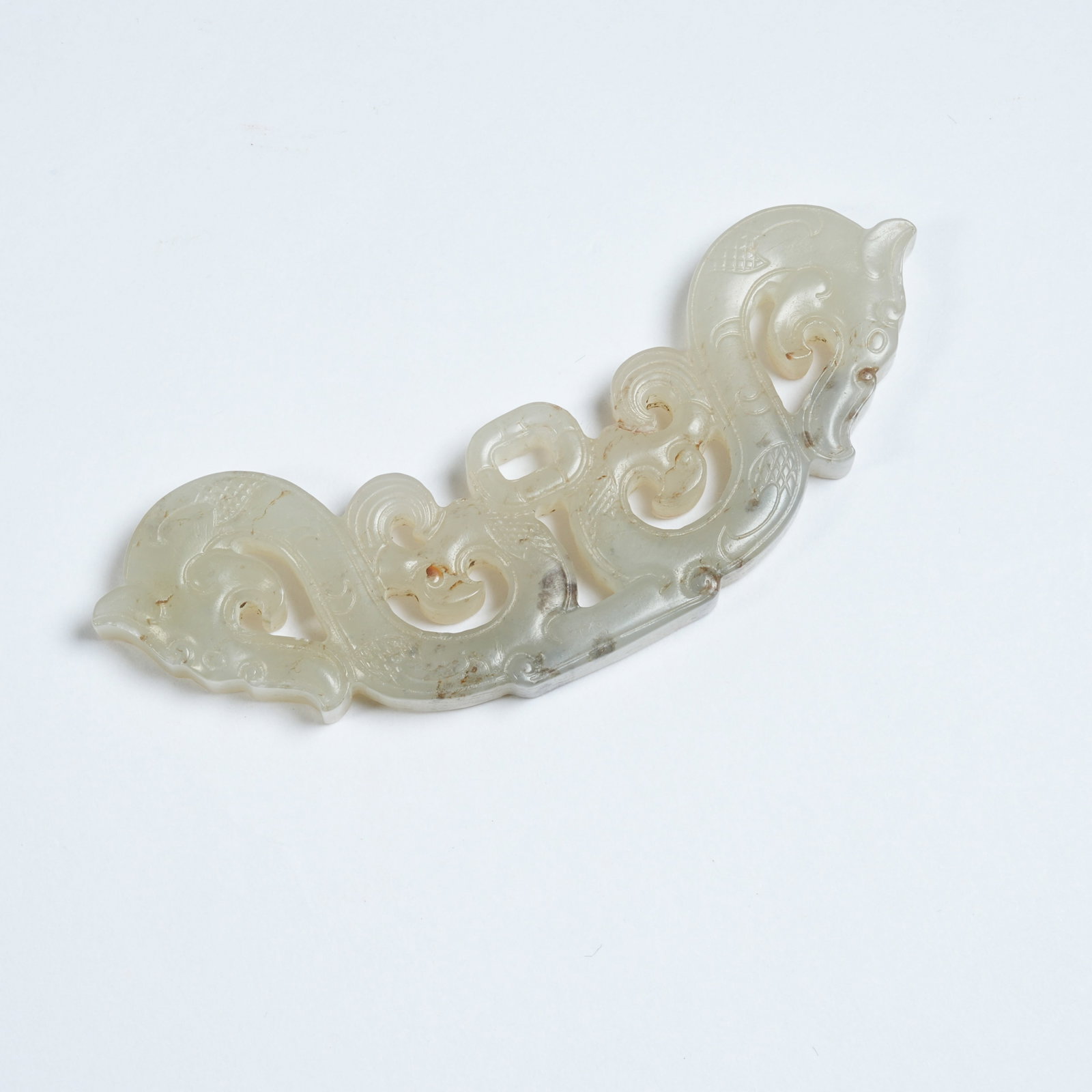 A ANCIENT JADE DOUBLE DRAGON PENDANT: Ancient Jade Double Dragon Pendant