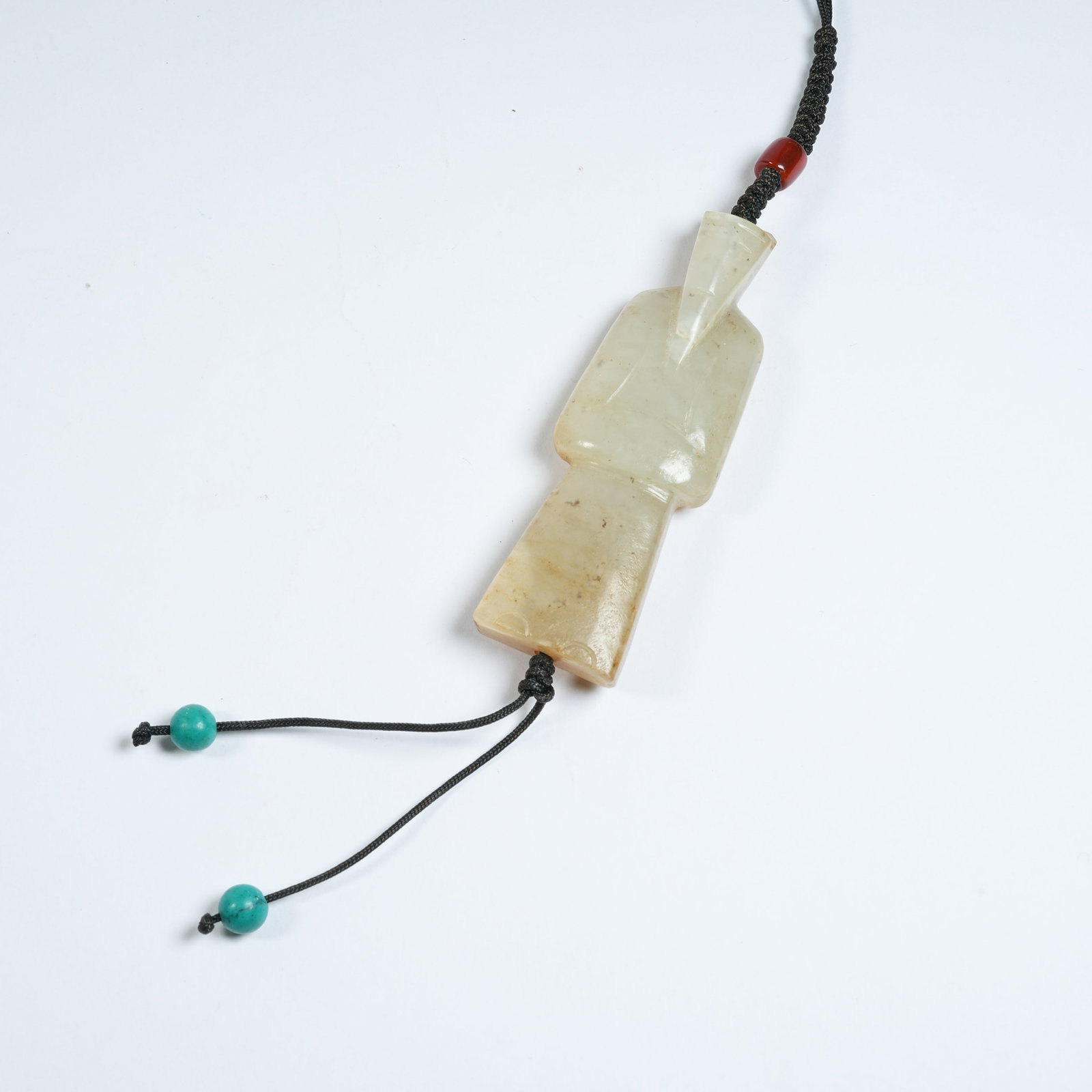 A ANCIENT JADE WENG ZHONG PENDANT: Ancient Jade Weng Zhong Pendant
