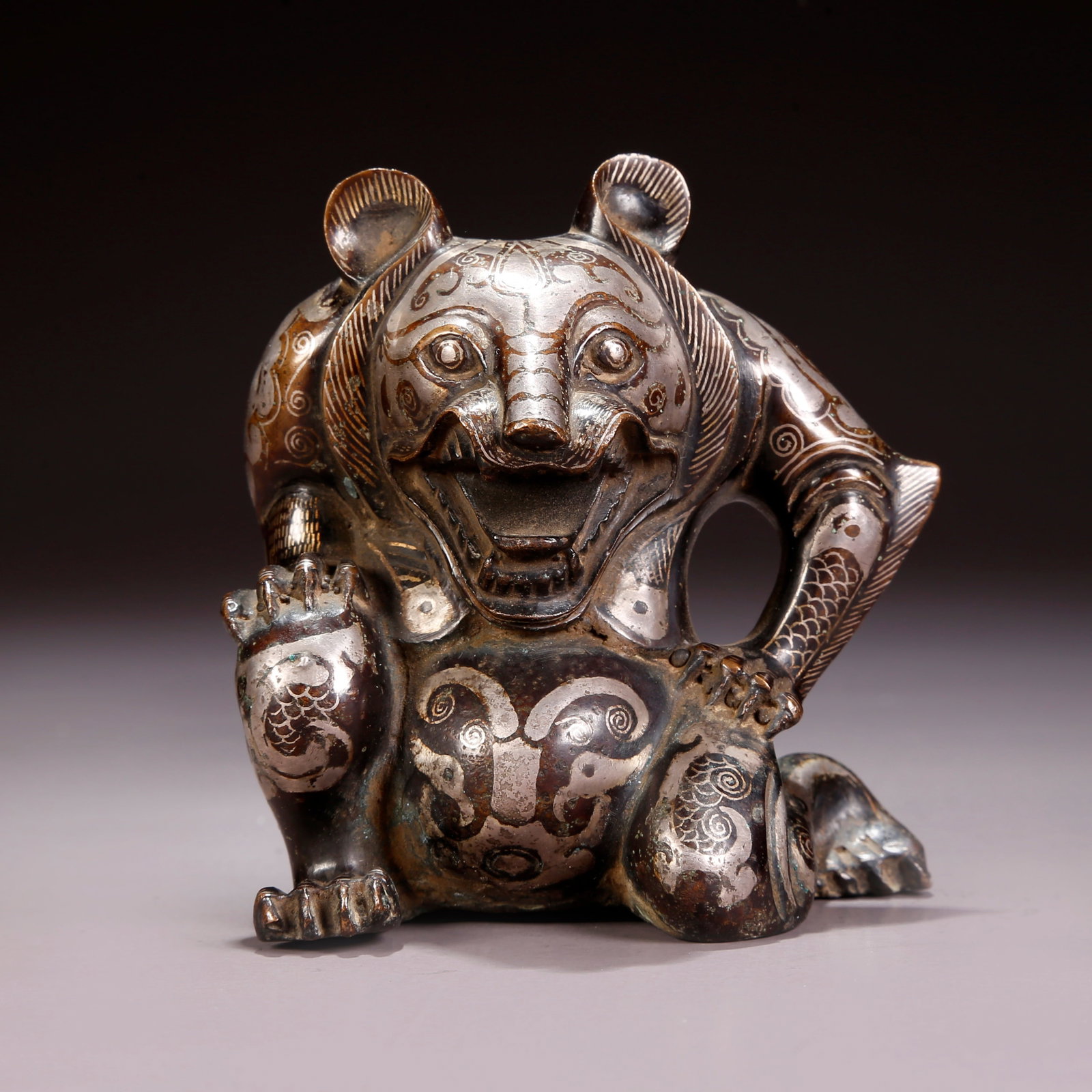 A SILVER-INLAID BRONZE BEAR FIGURINE: Silver-Inlaid Bronze Bear Figurine