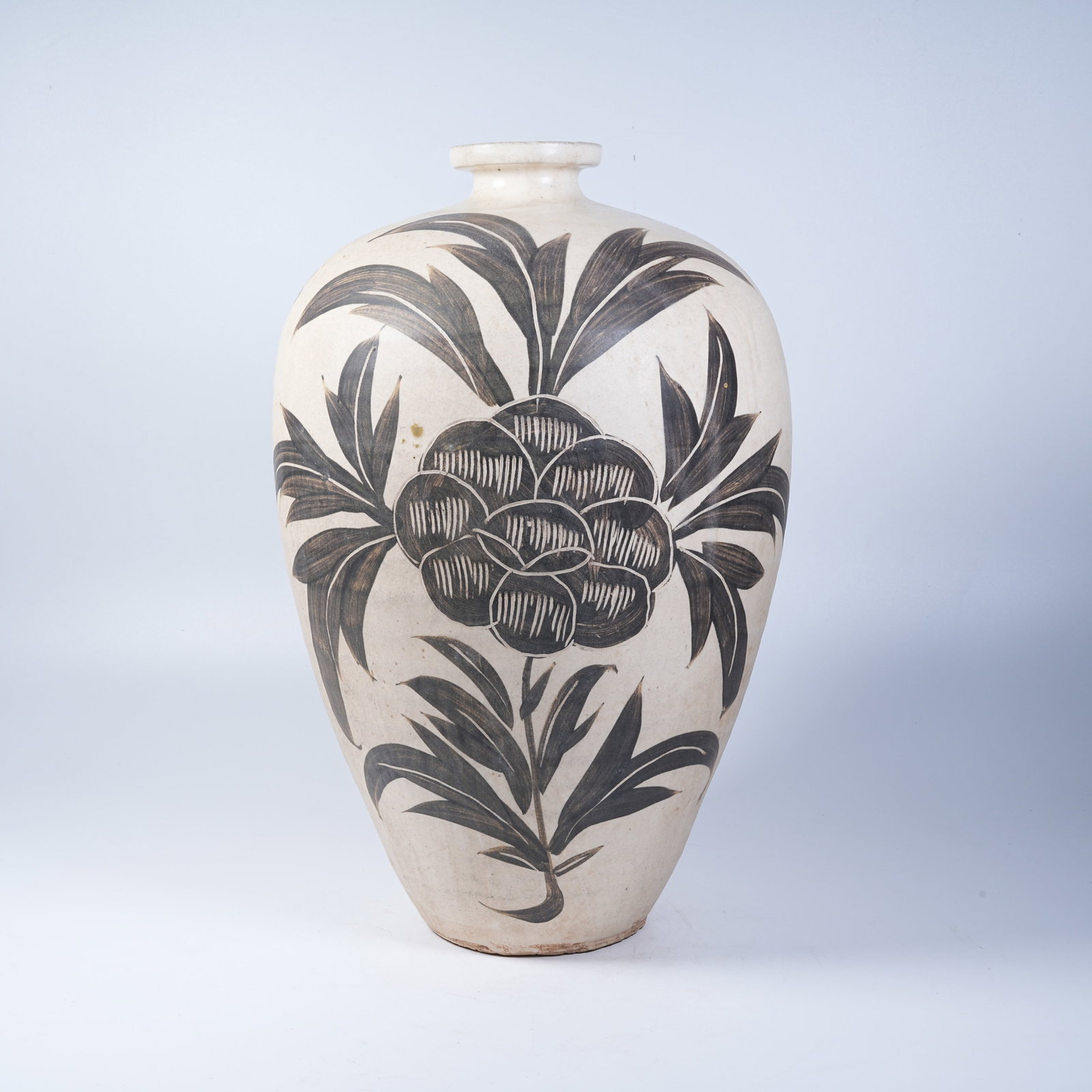 A CIZHOU KILN PRUNUS VASE WITH FLOWER AND BUTTERFLY PATTERNS: Cizhou Kiln Prunus Vase with Flower and Butterfly Patterns