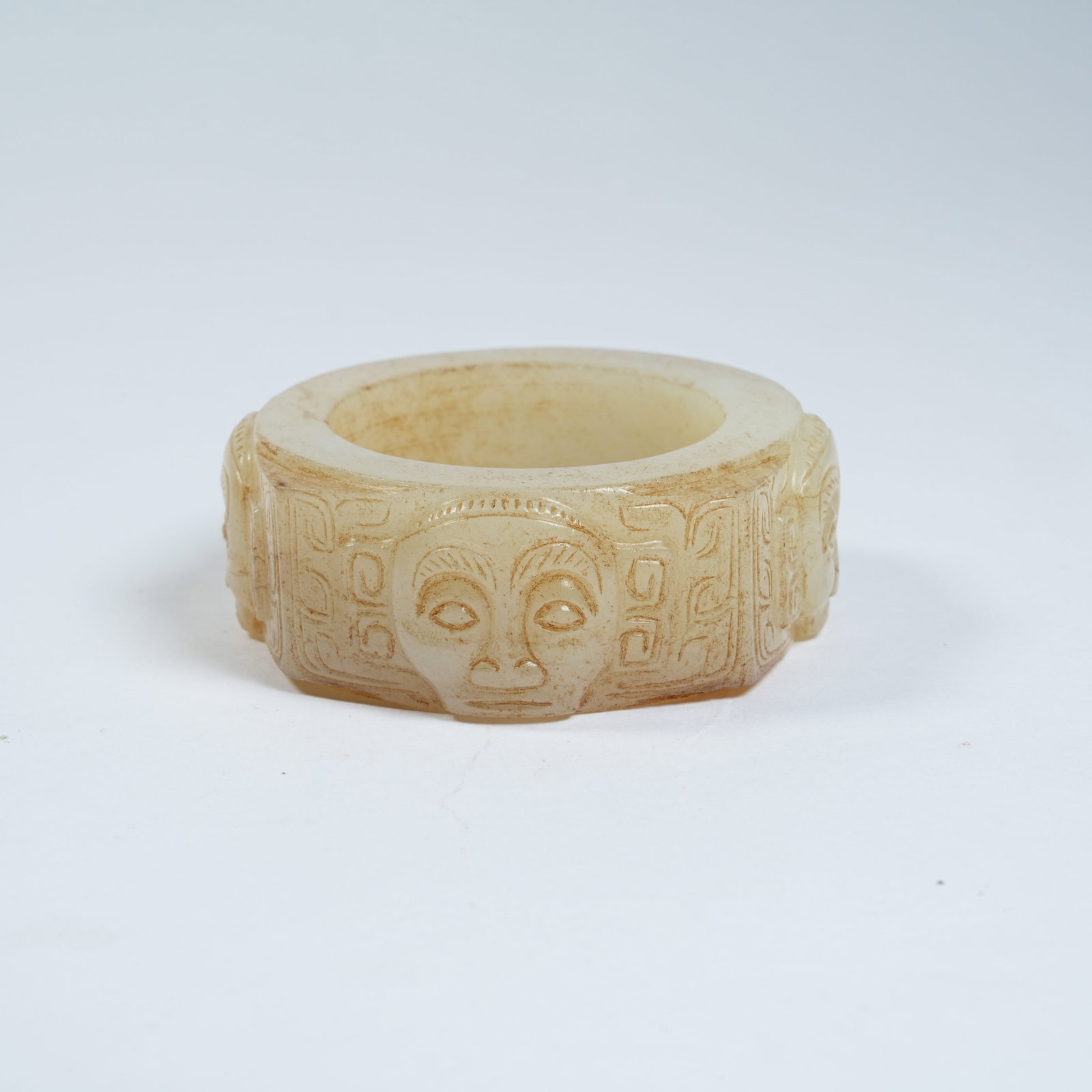 A ANCIENT JADE RING WITH DEITY MASK PATTERNS: Ancient Jade Ring with Deity Mask Patterns