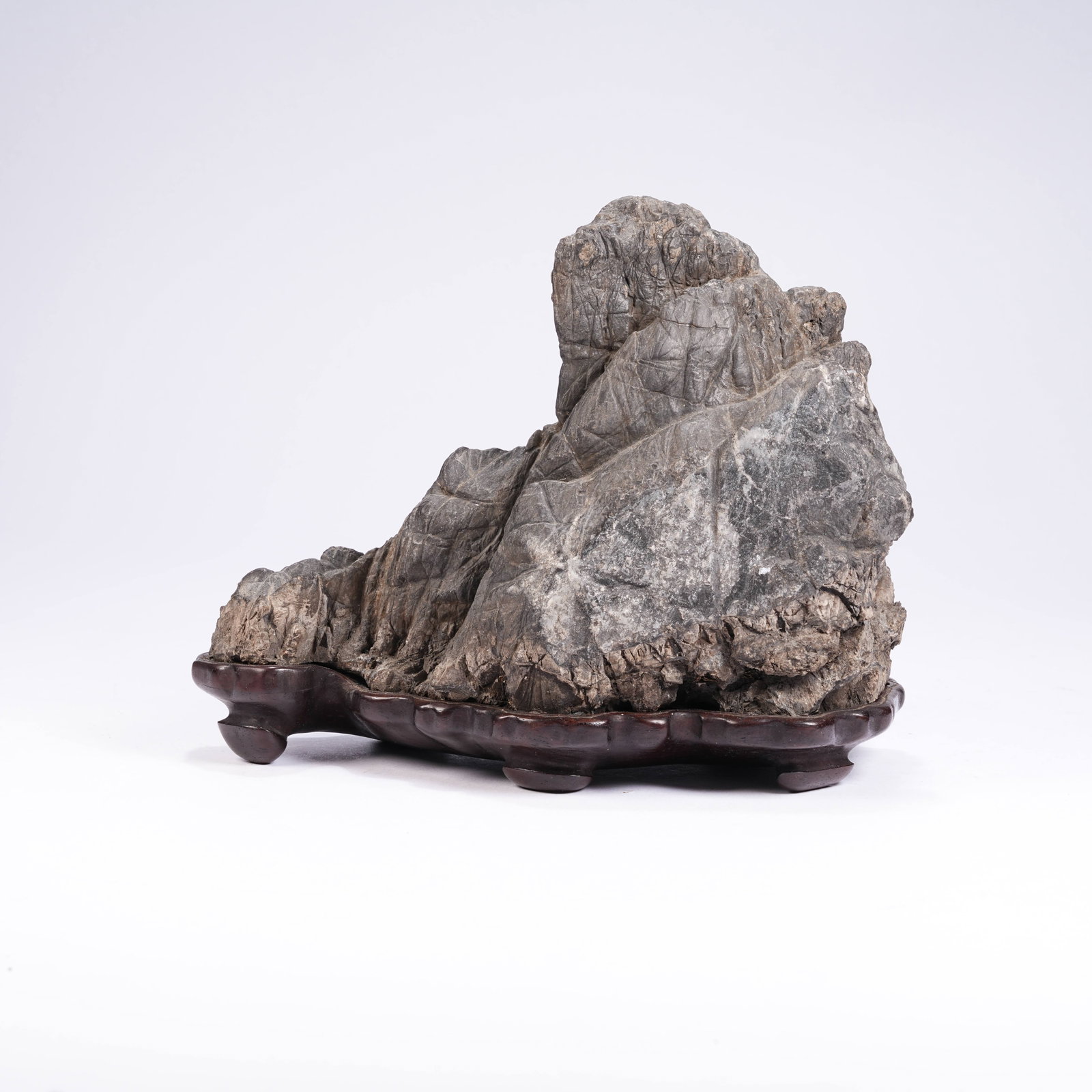 A TAIHU STONE MOUNTAIN ORNAMENT: Taihu Stone Mountain Ornament