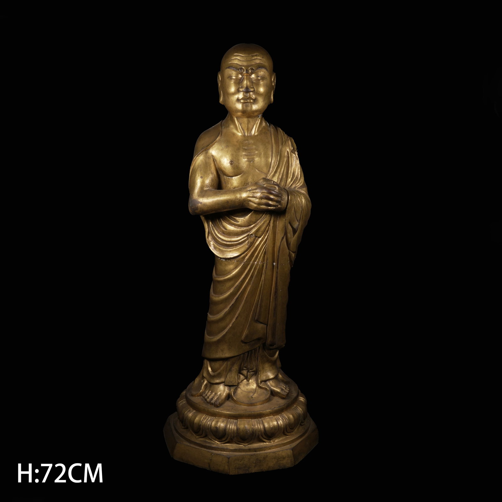 A GILT-BRONZE STANDING KASYAPA (MAHAKASYAPA) STATUE: Gilt-Bronze Standing Kasyapa (Mahakasyapa) Statue