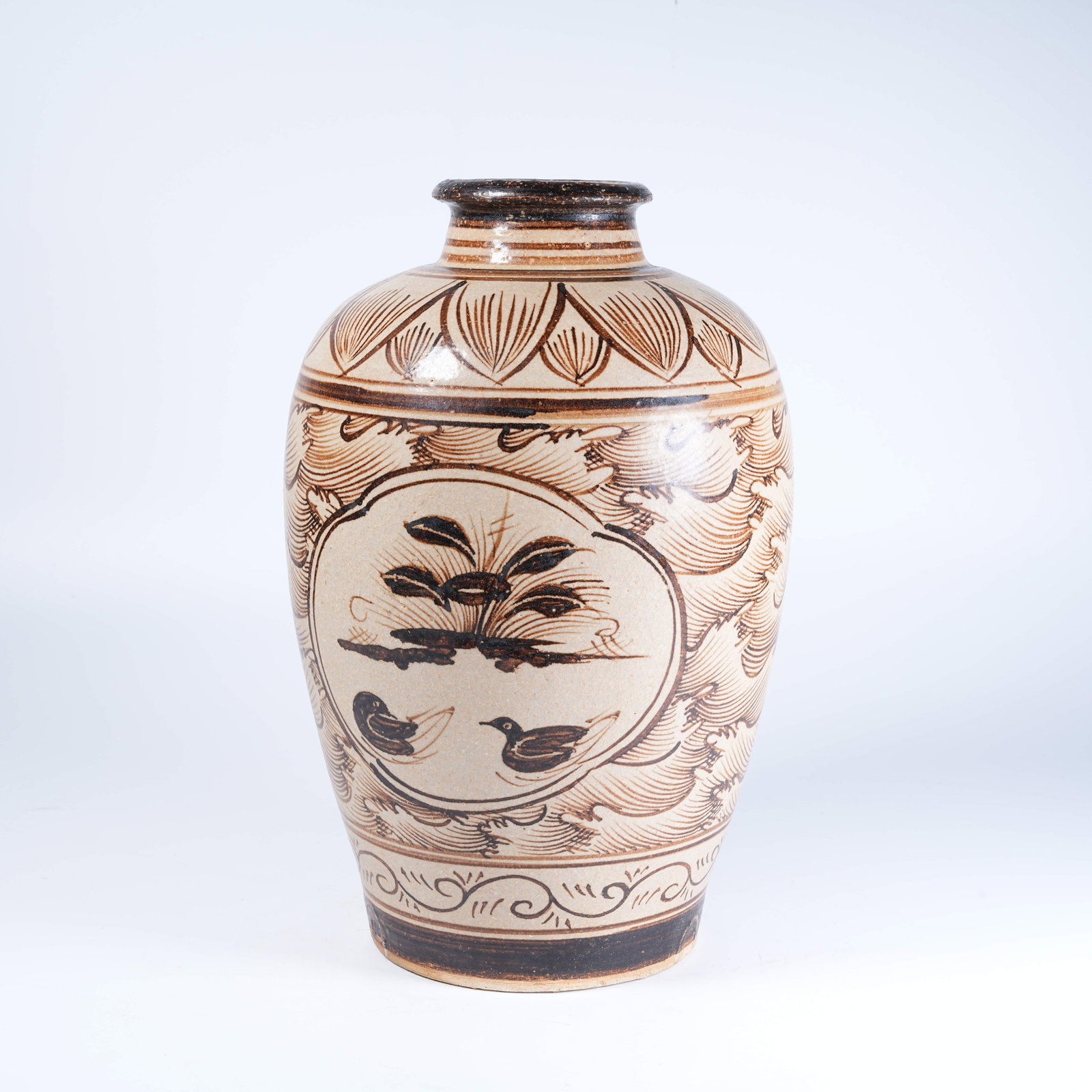 A CIZHOU KILN JAR WITH LOTUS POND LEISURE PATTERNS (1 of 9)