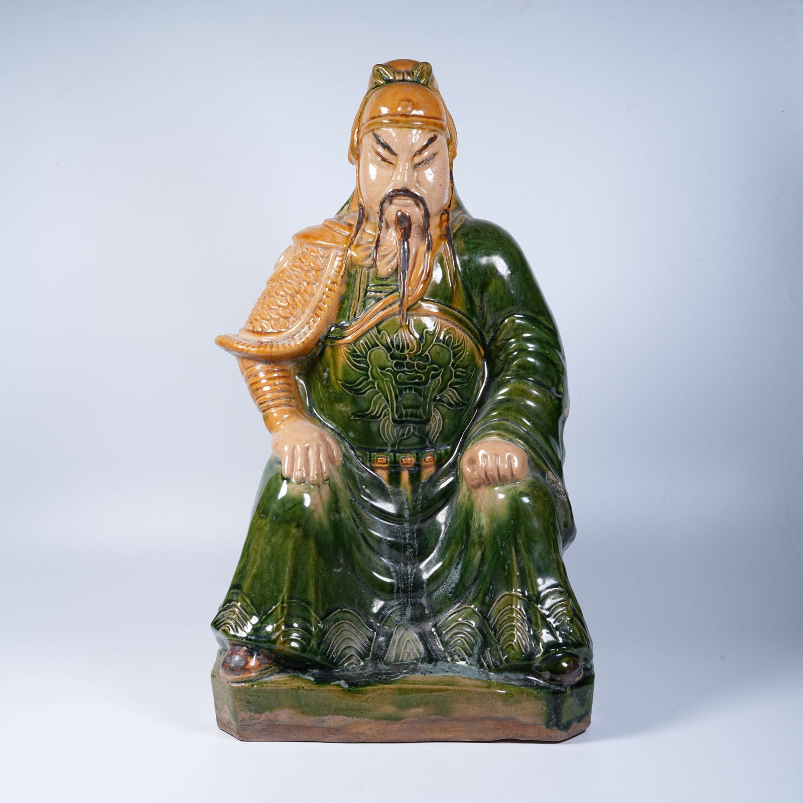 A PLAIN SANCAI SEATED STATUE OF GUAN GONG (1 of 9)