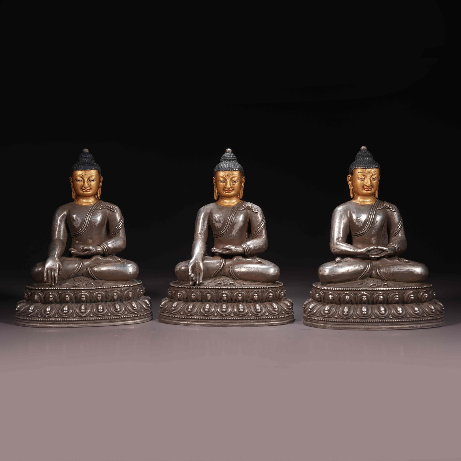 A SET OF GILT BRONZE THREE BUDDHAS (1 of 8)
